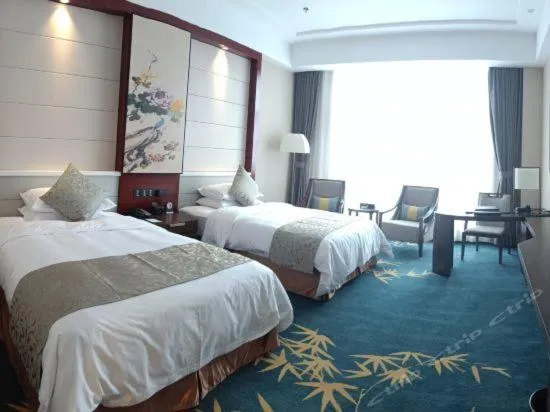 Bed in Binhai Jinling International Hotel