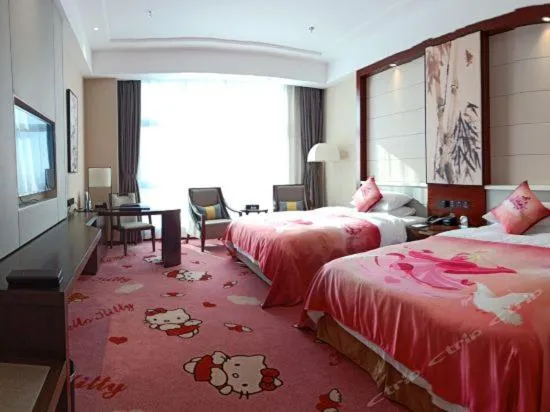 Bed in Binhai Jinling International Hotel