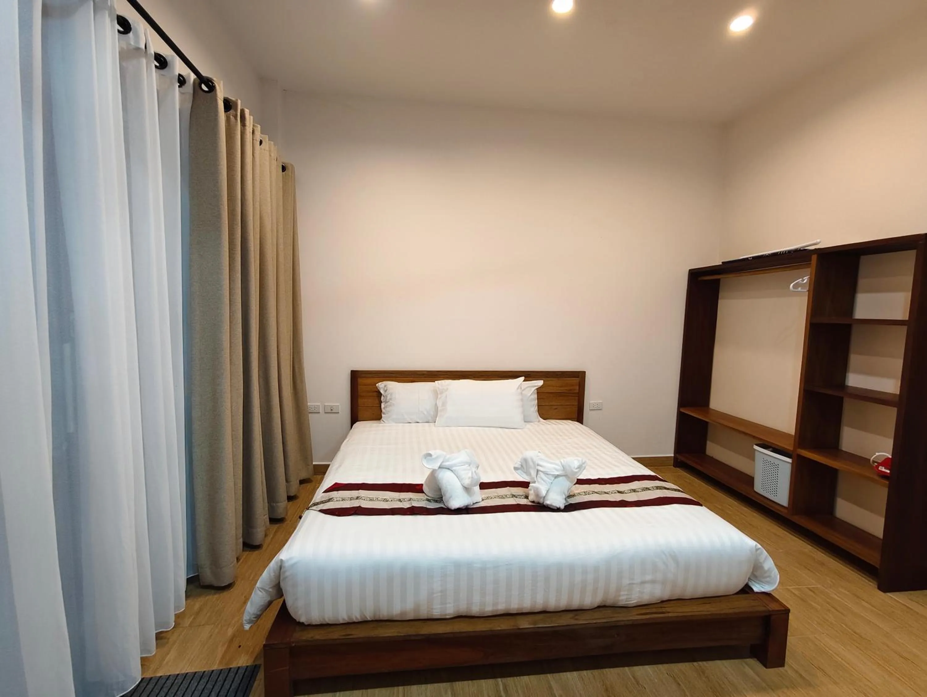 Bed in Le Grand Bleu Hotel