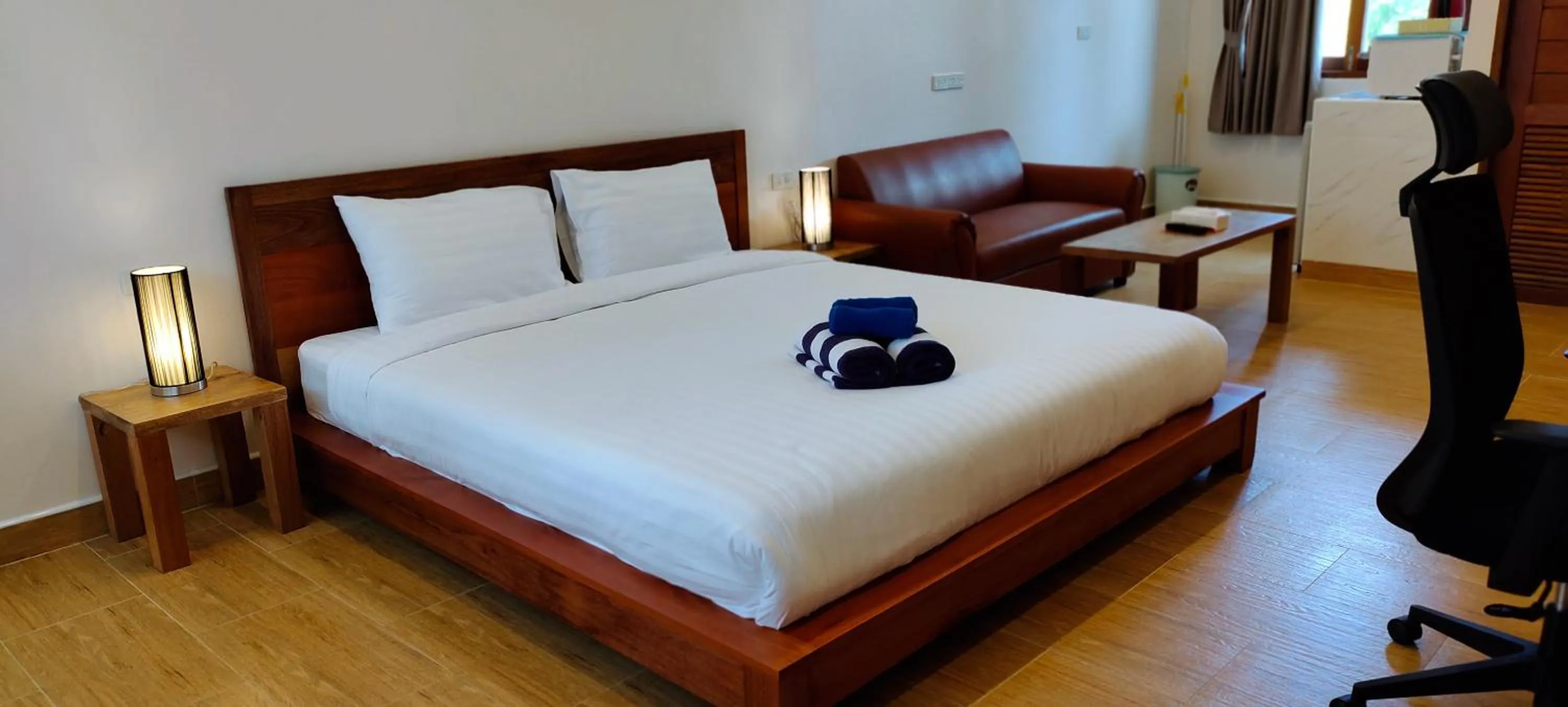 Bed in Le Grand Bleu Hotel