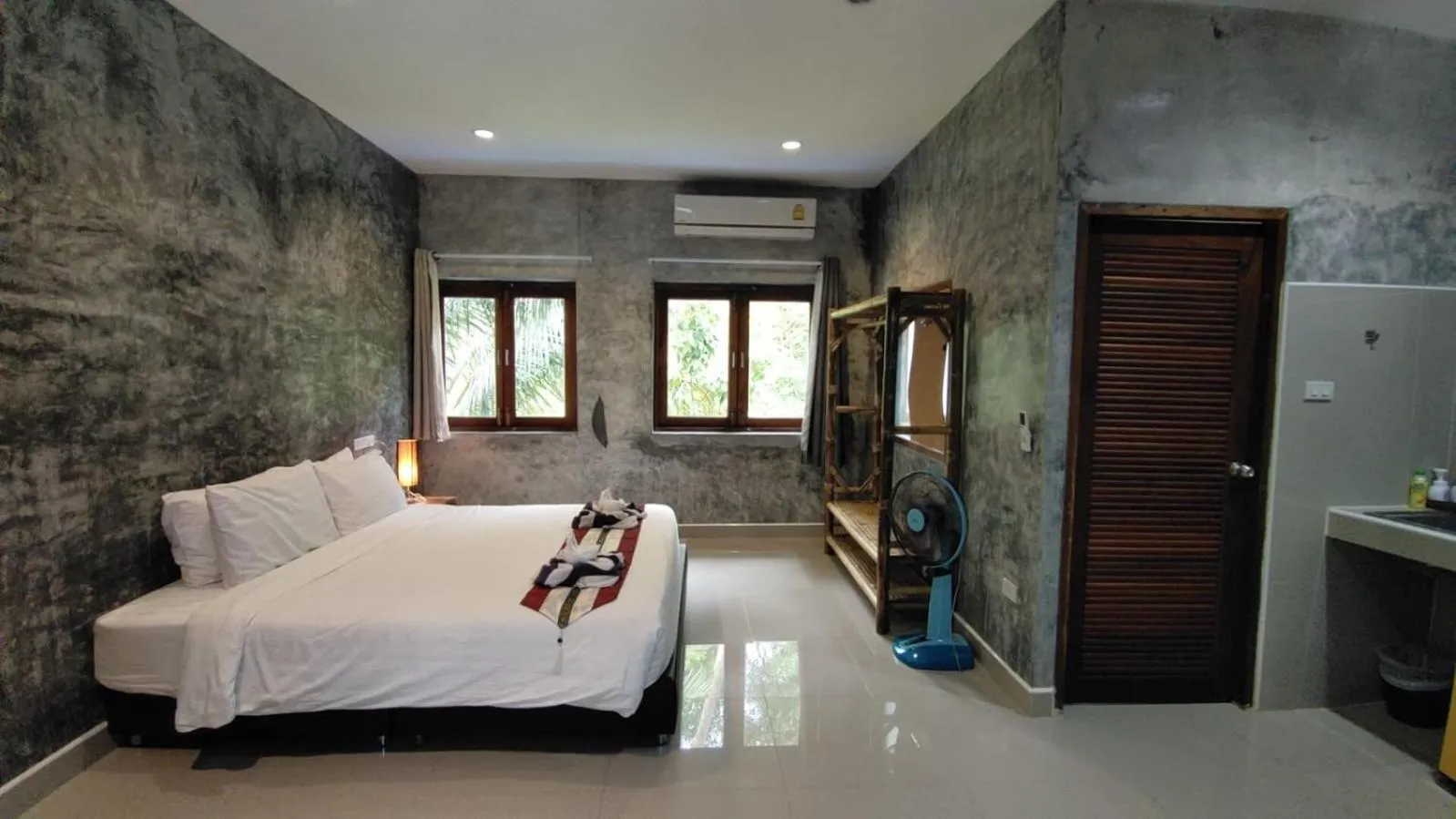 Bed in Le Grand Bleu Hotel