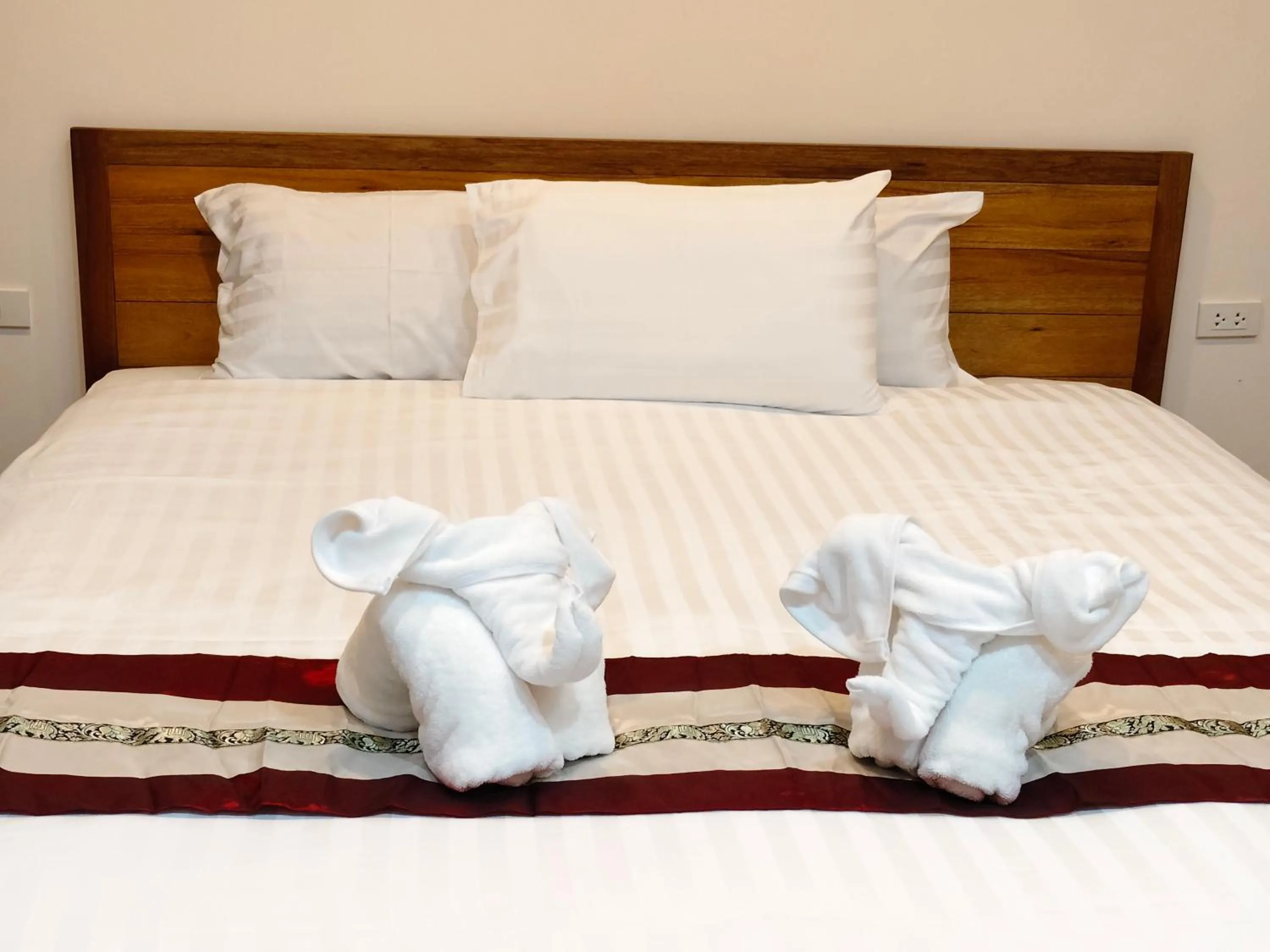 Bed in Le Grand Bleu Hotel