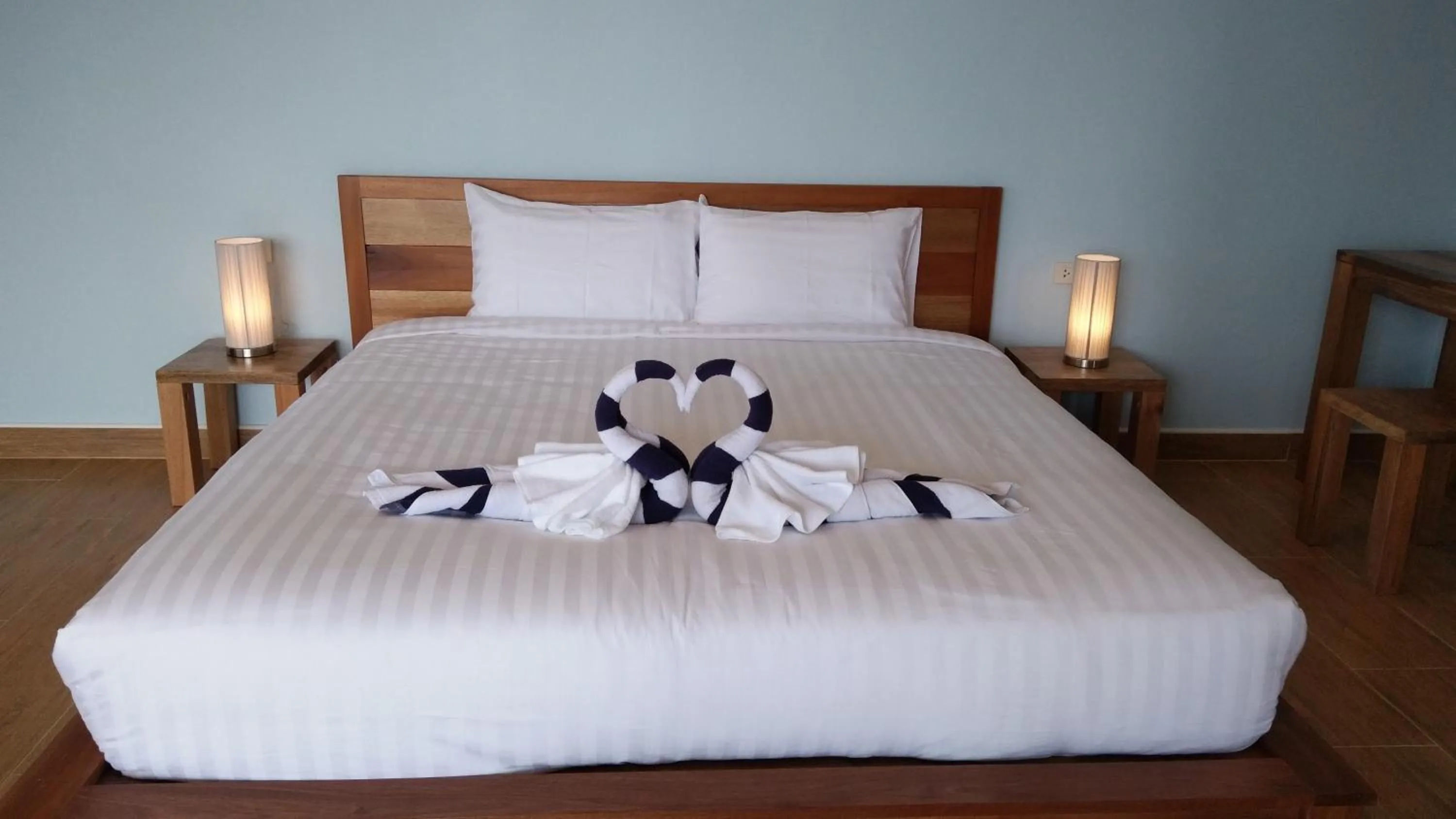 Bed in Le Grand Bleu Hotel