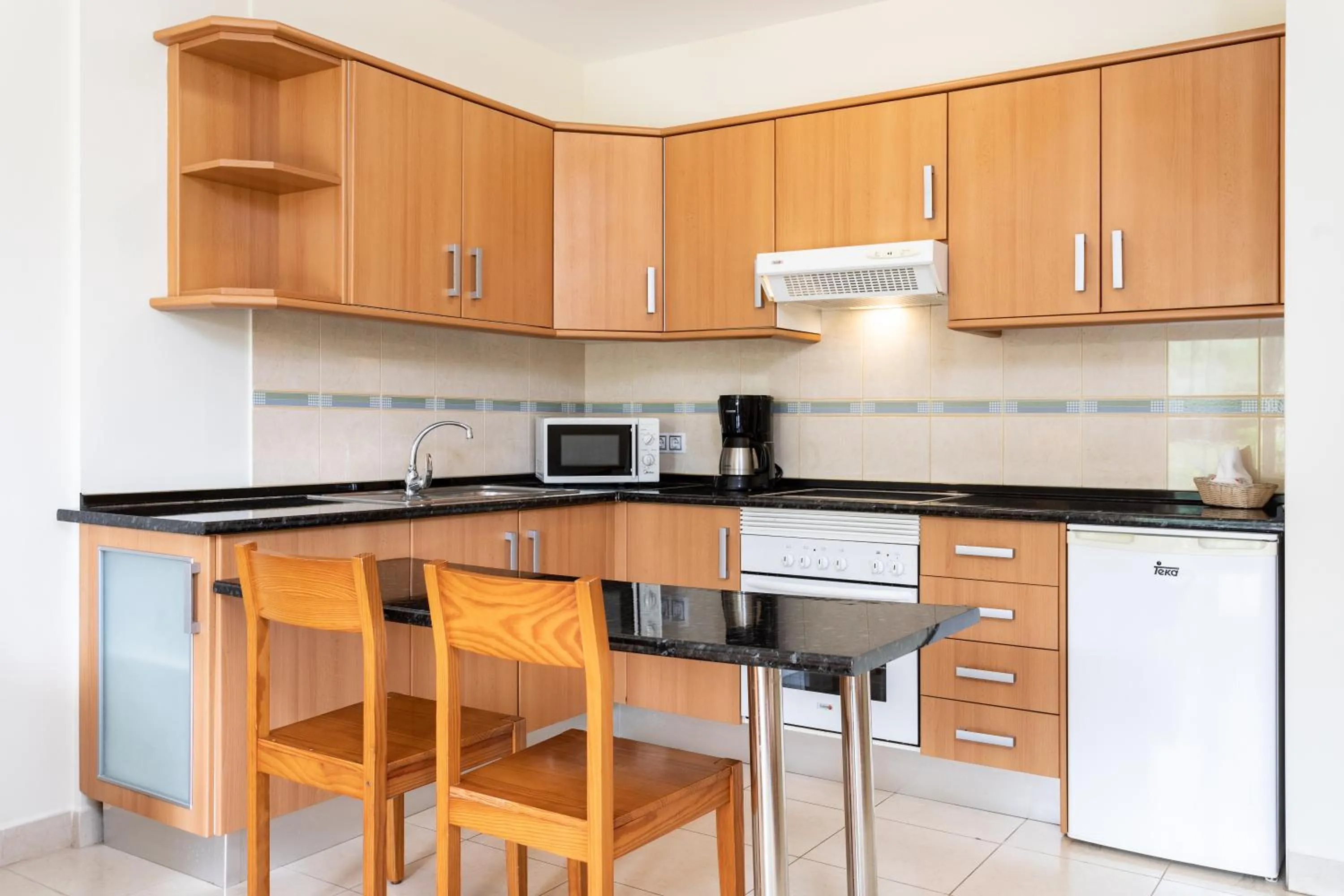 Kitchen or kitchenette in Residencial El Llano