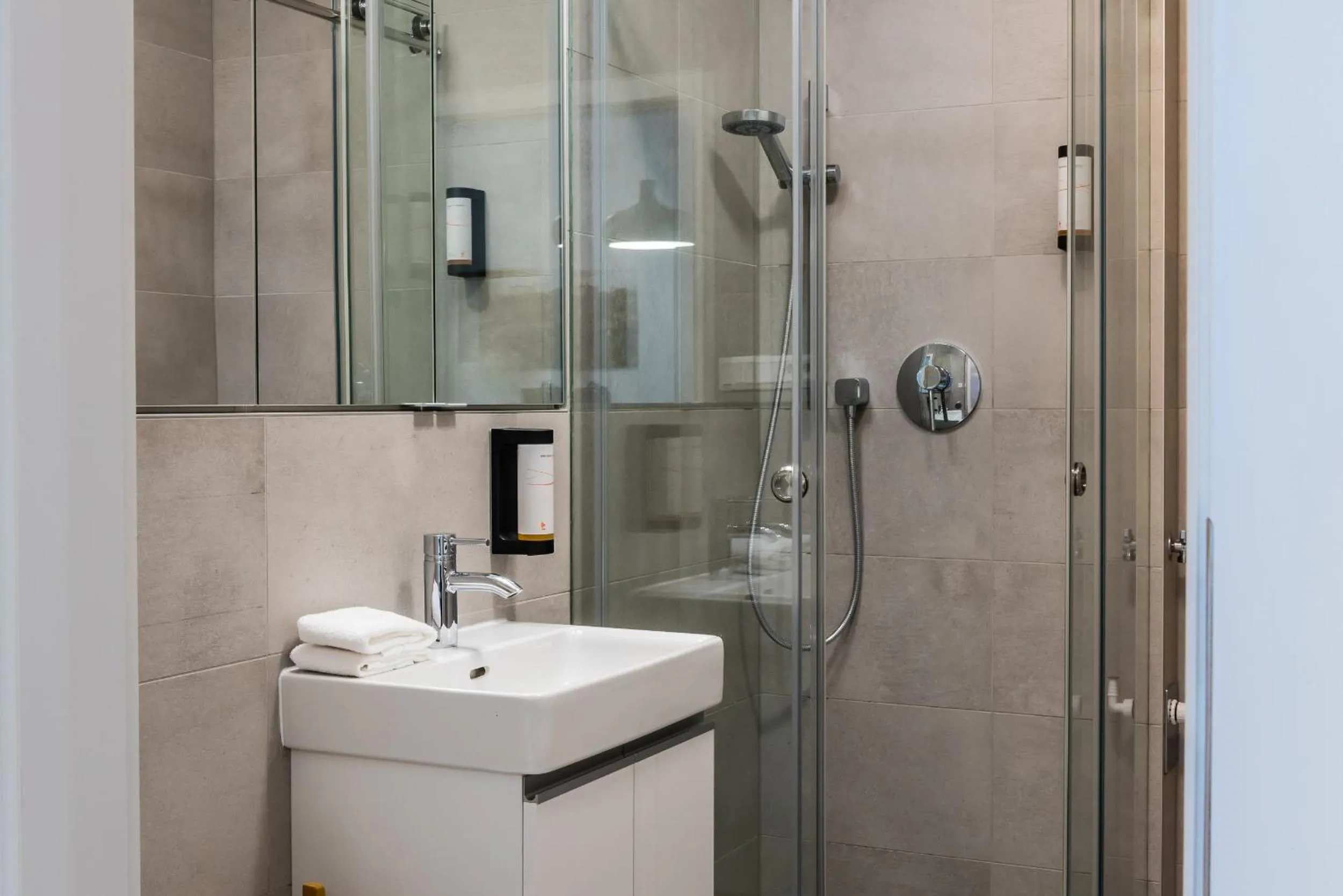Shower in City Castle Apartments Free Parking
