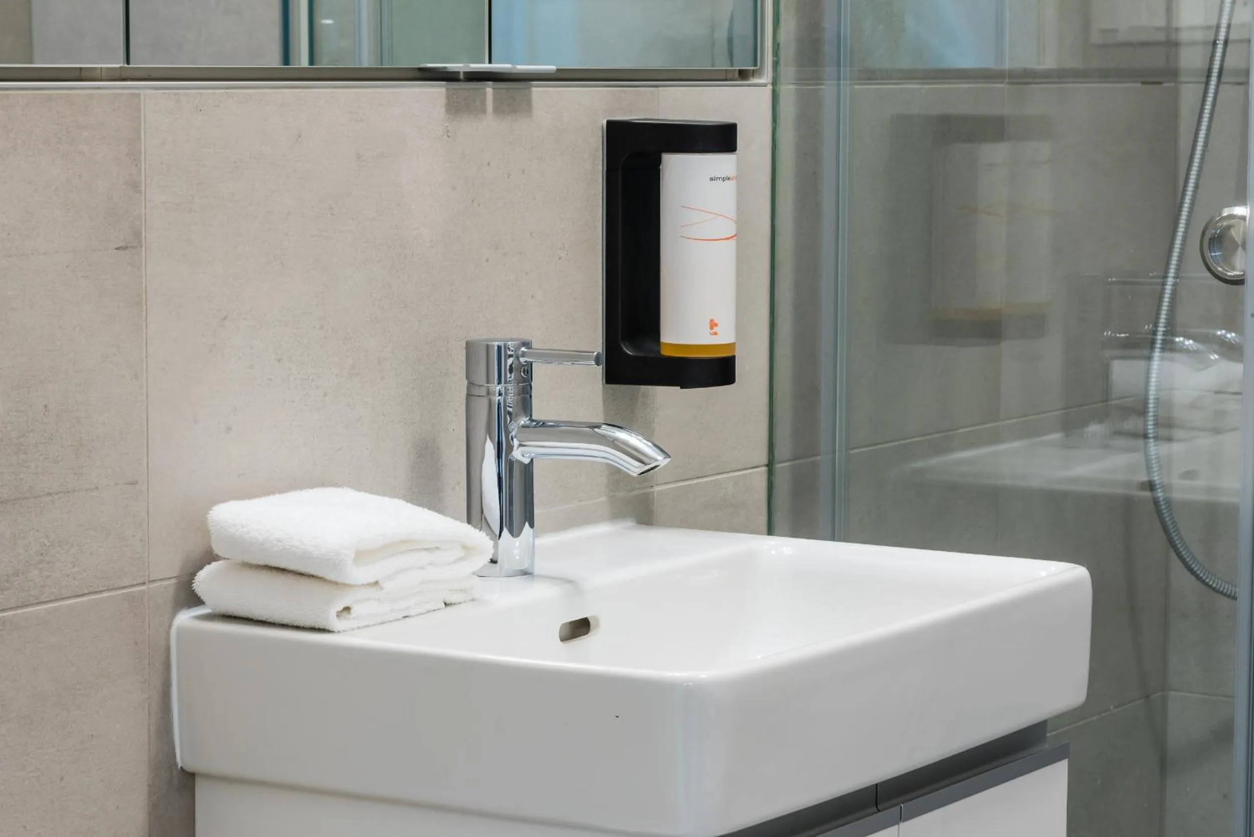 Shower in City Castle Apartments Free Parking