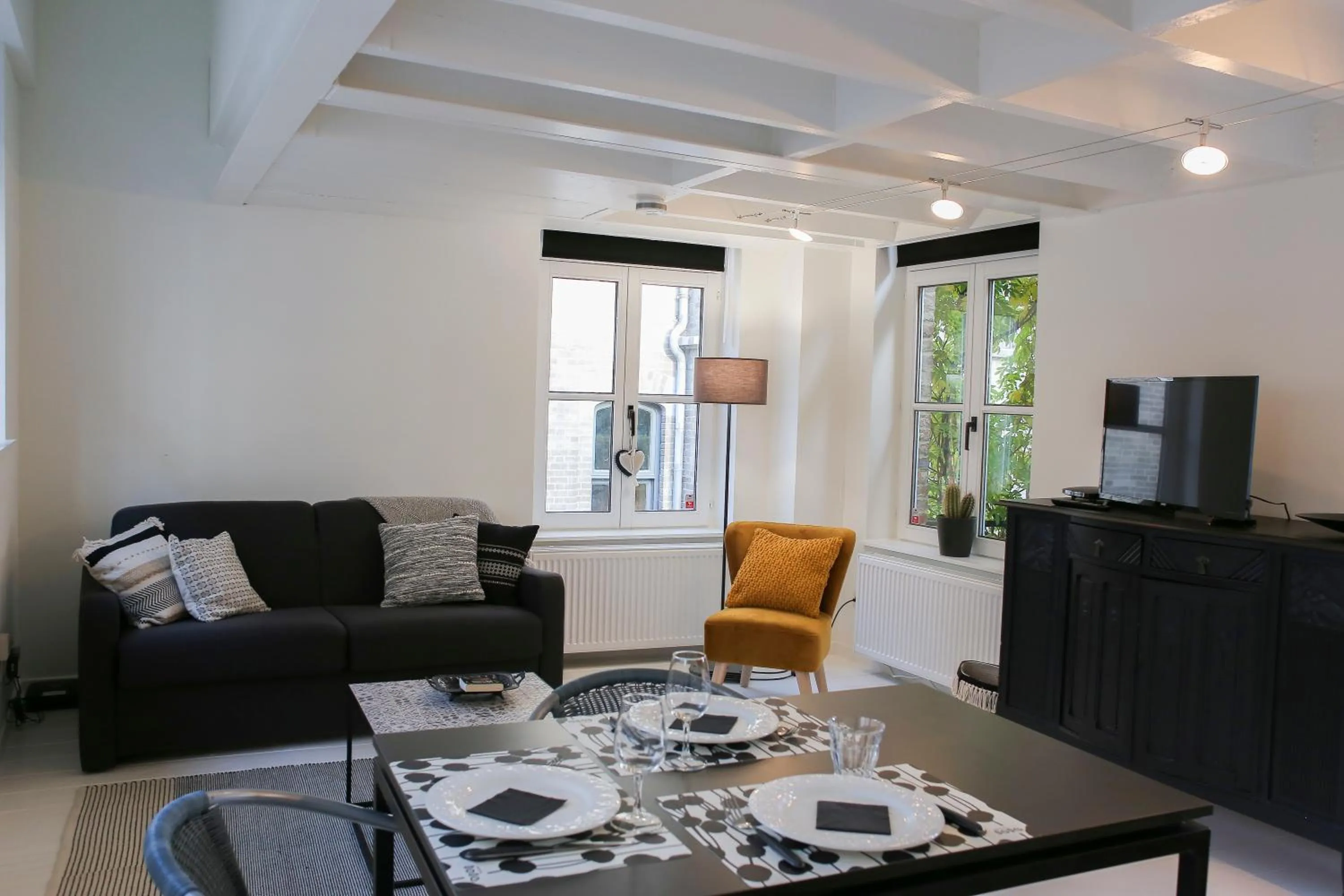 Living room in La Garçonnière de Wiertz - Esc'Appart