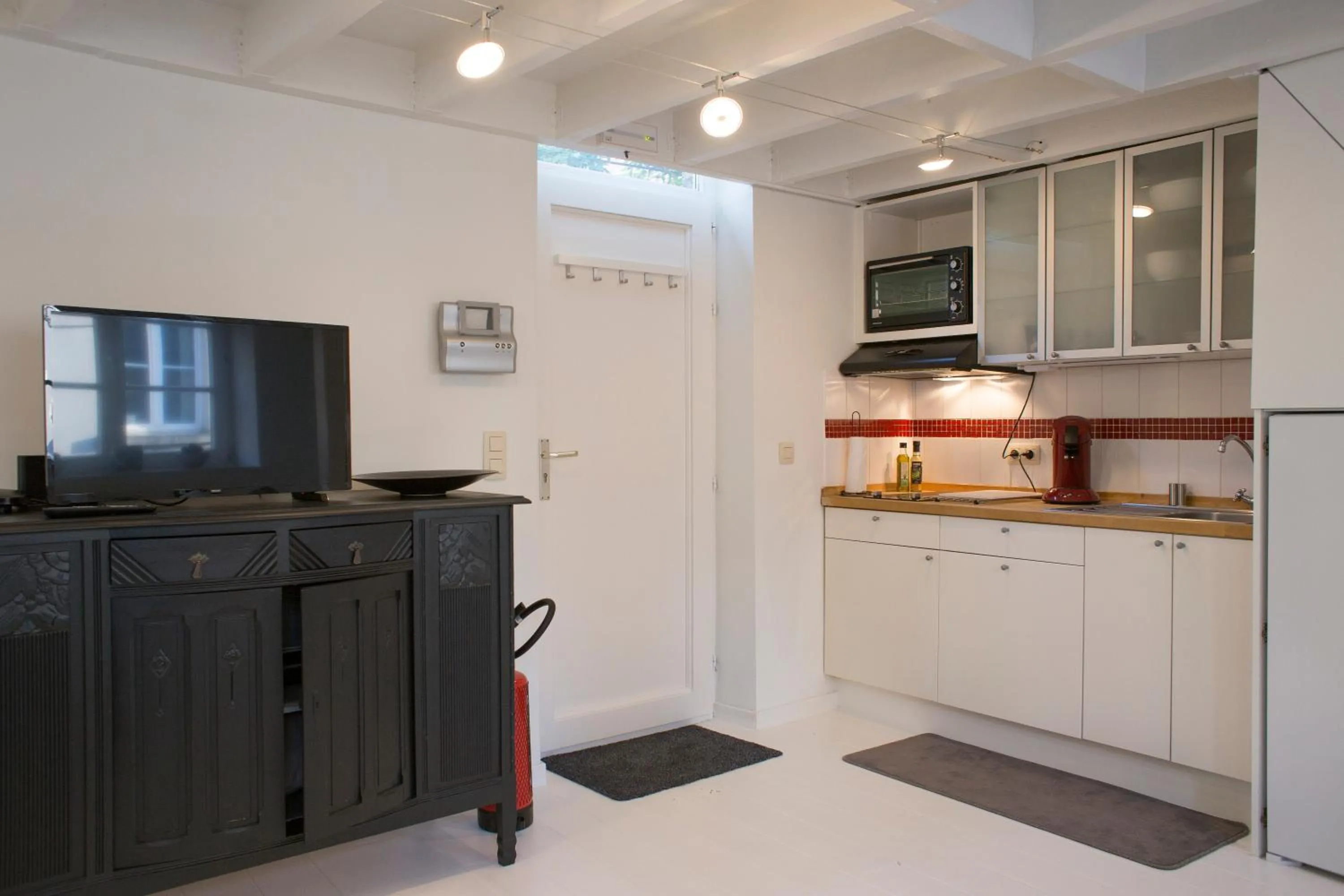 Kitchen or kitchenette in La Garçonnière de Wiertz - Esc'Appart