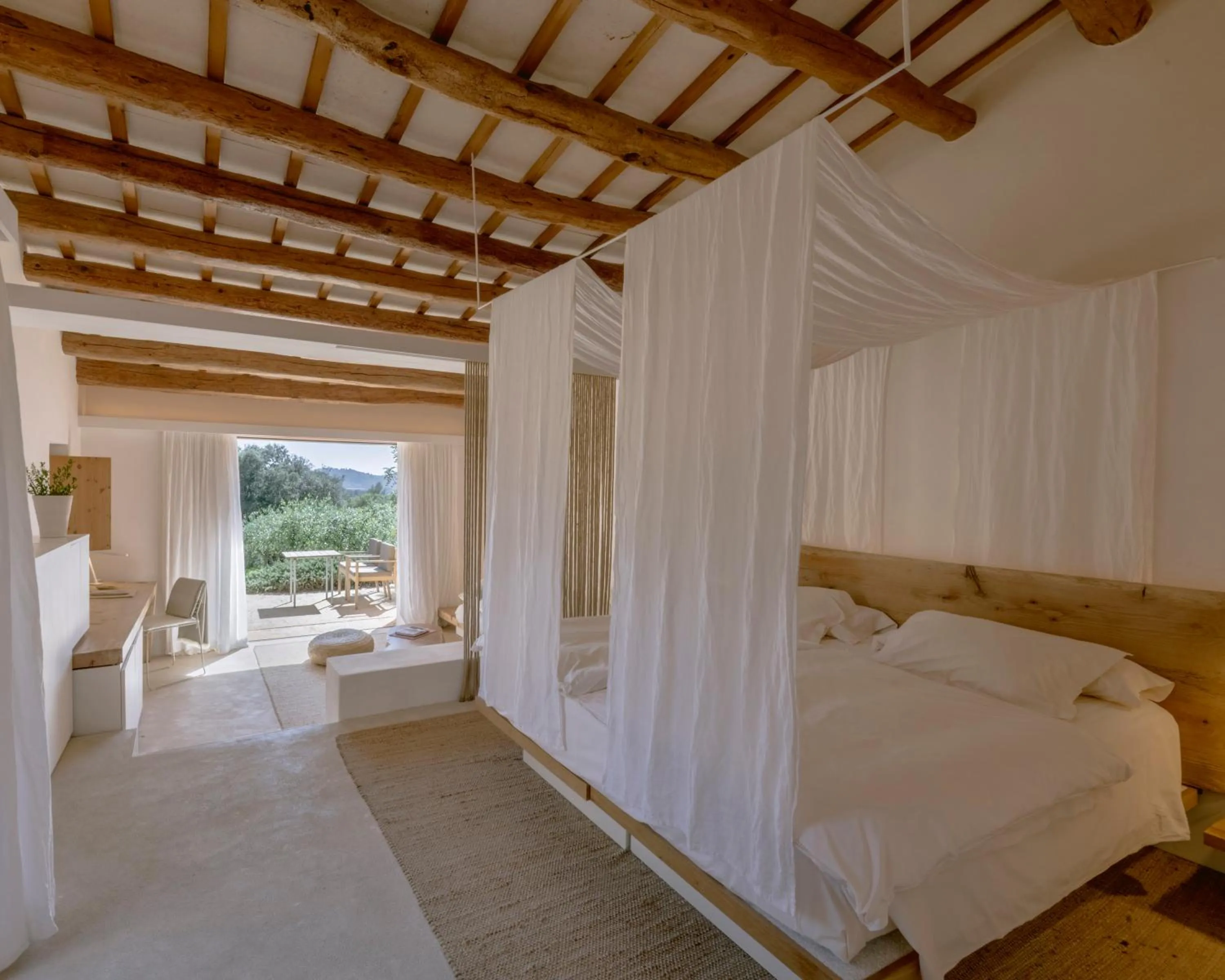 Living room, Bed in Es Raco d'Arta, Mallorca, a Member of Design Hotels