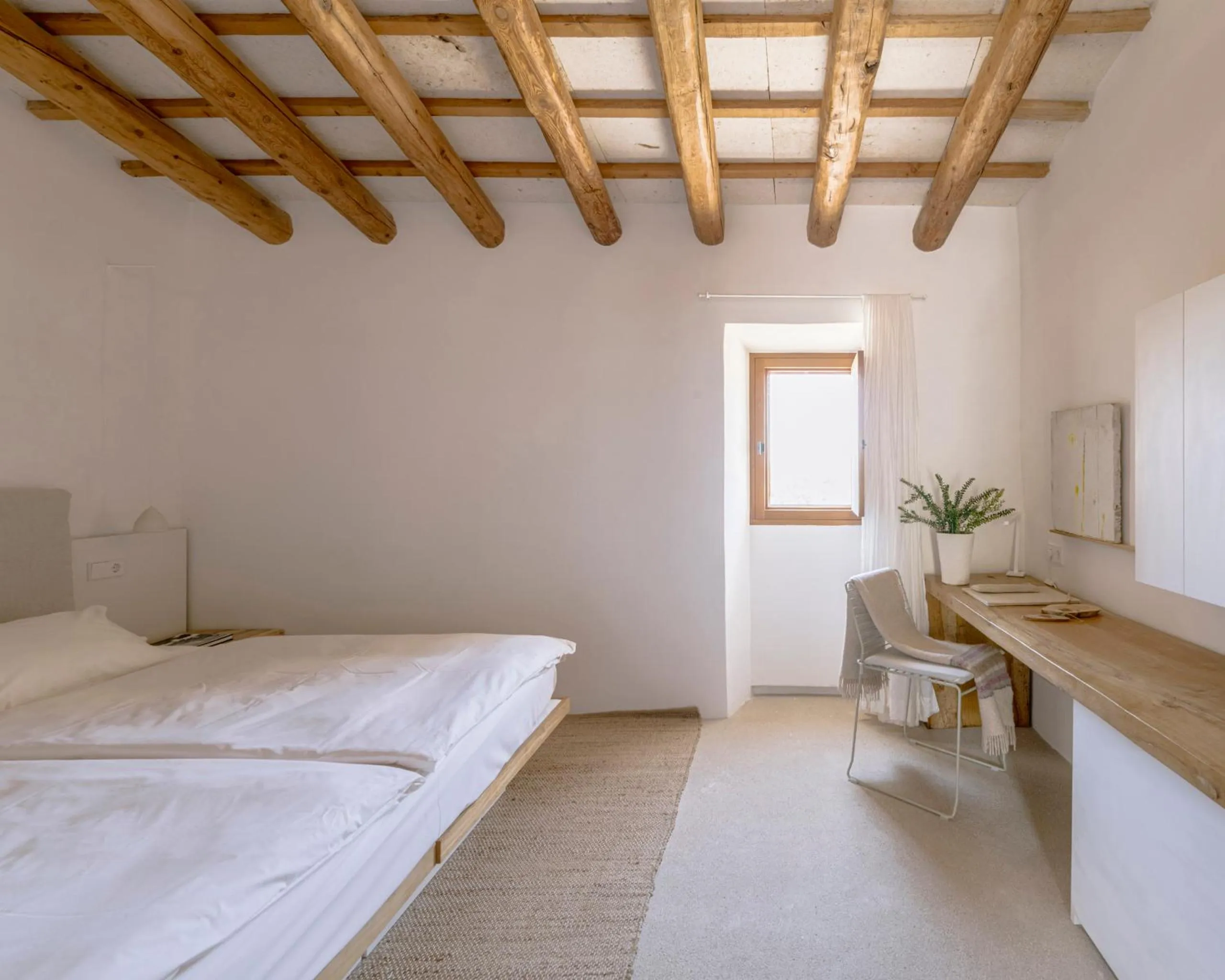 Living room, Bed in Es Raco d'Arta, Mallorca, a Member of Design Hotels