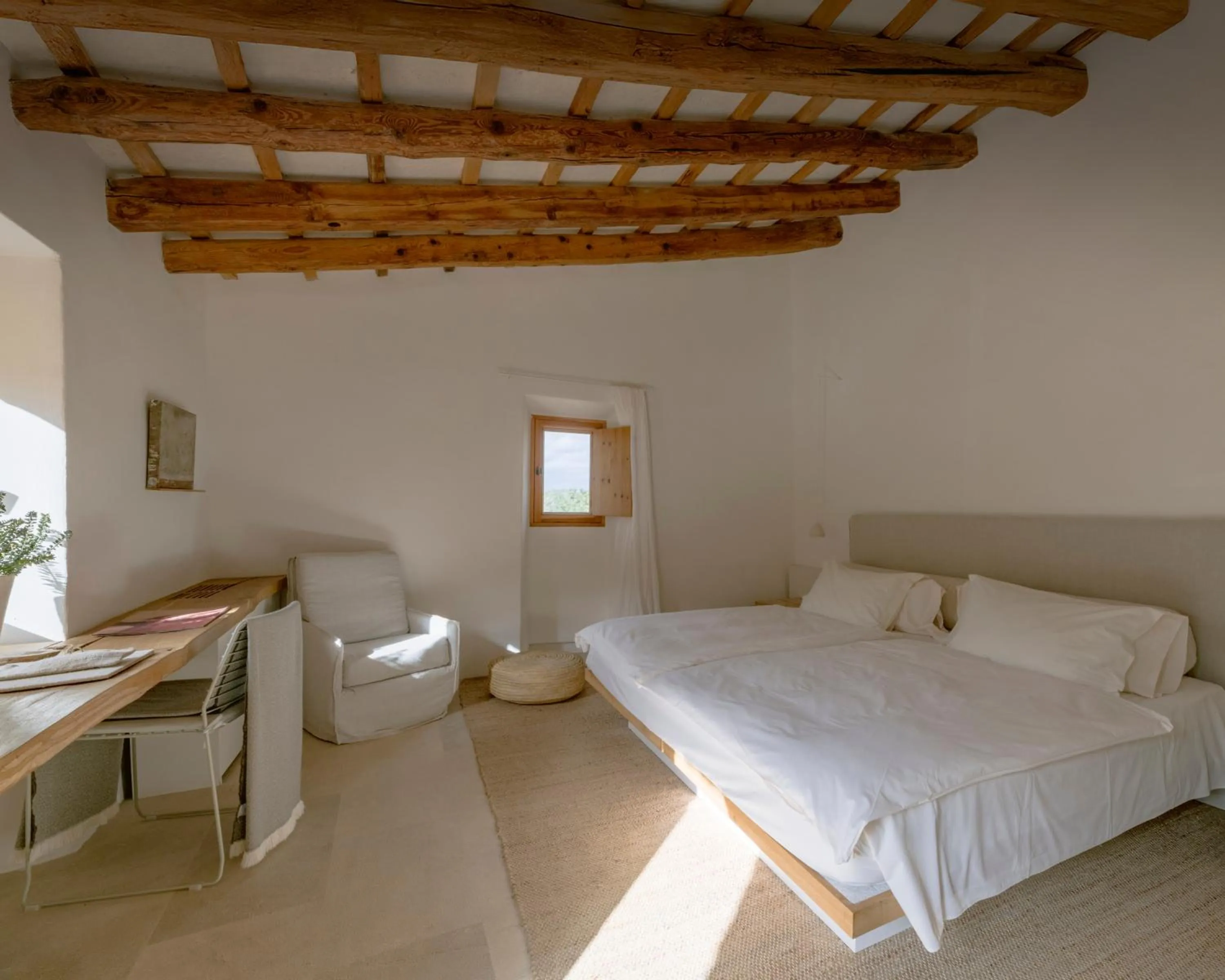 Living room, Bed in Es Raco d'Arta, Mallorca, a Member of Design Hotels
