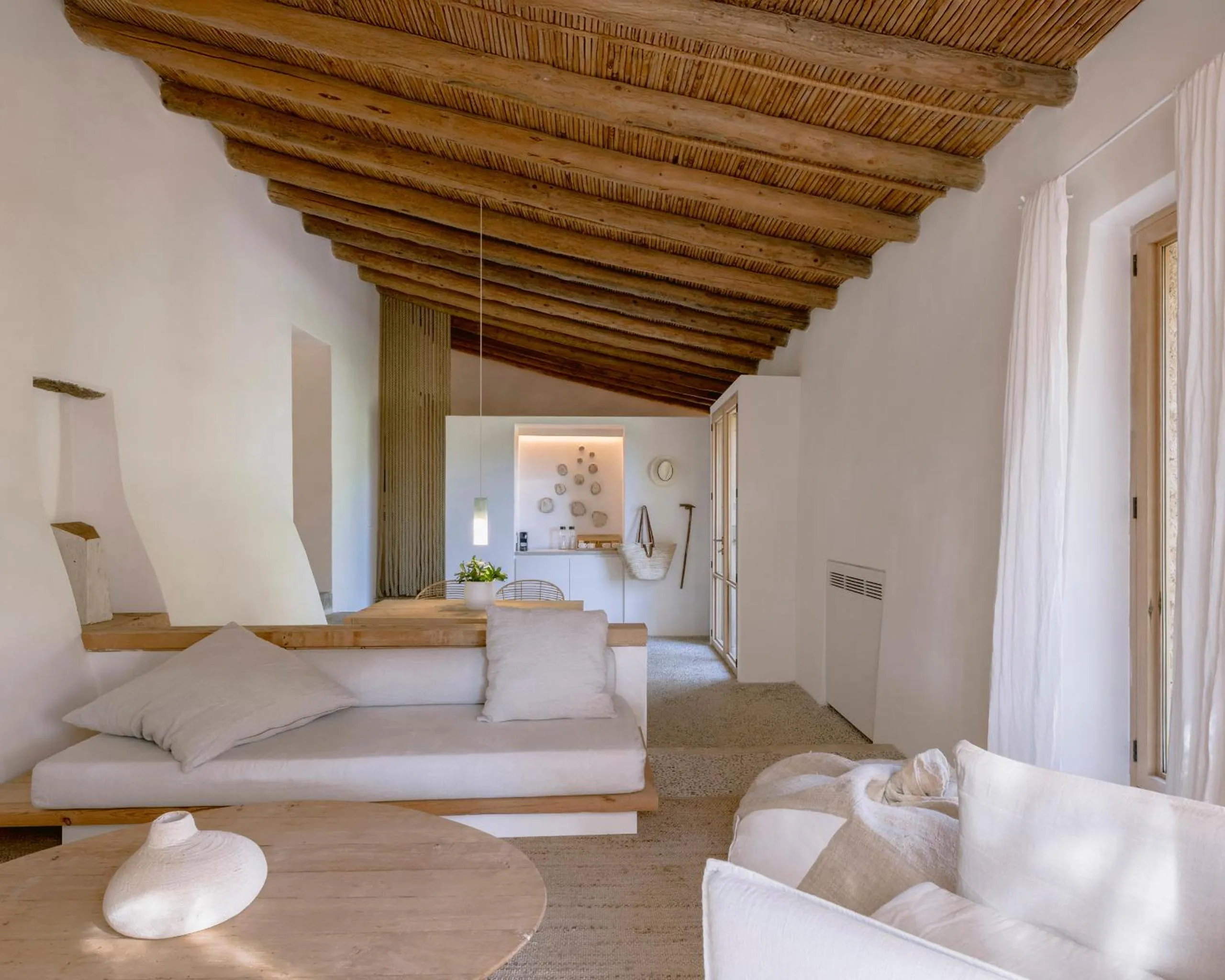 Living room, Bed in Es Raco d'Arta, Mallorca, a Member of Design Hotels