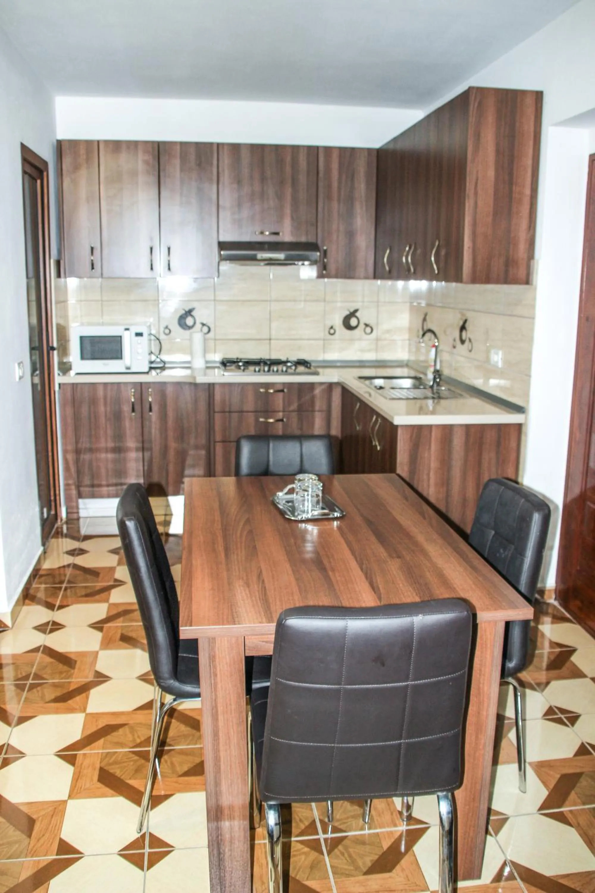 Kitchen or kitchenette in Hotel Corina