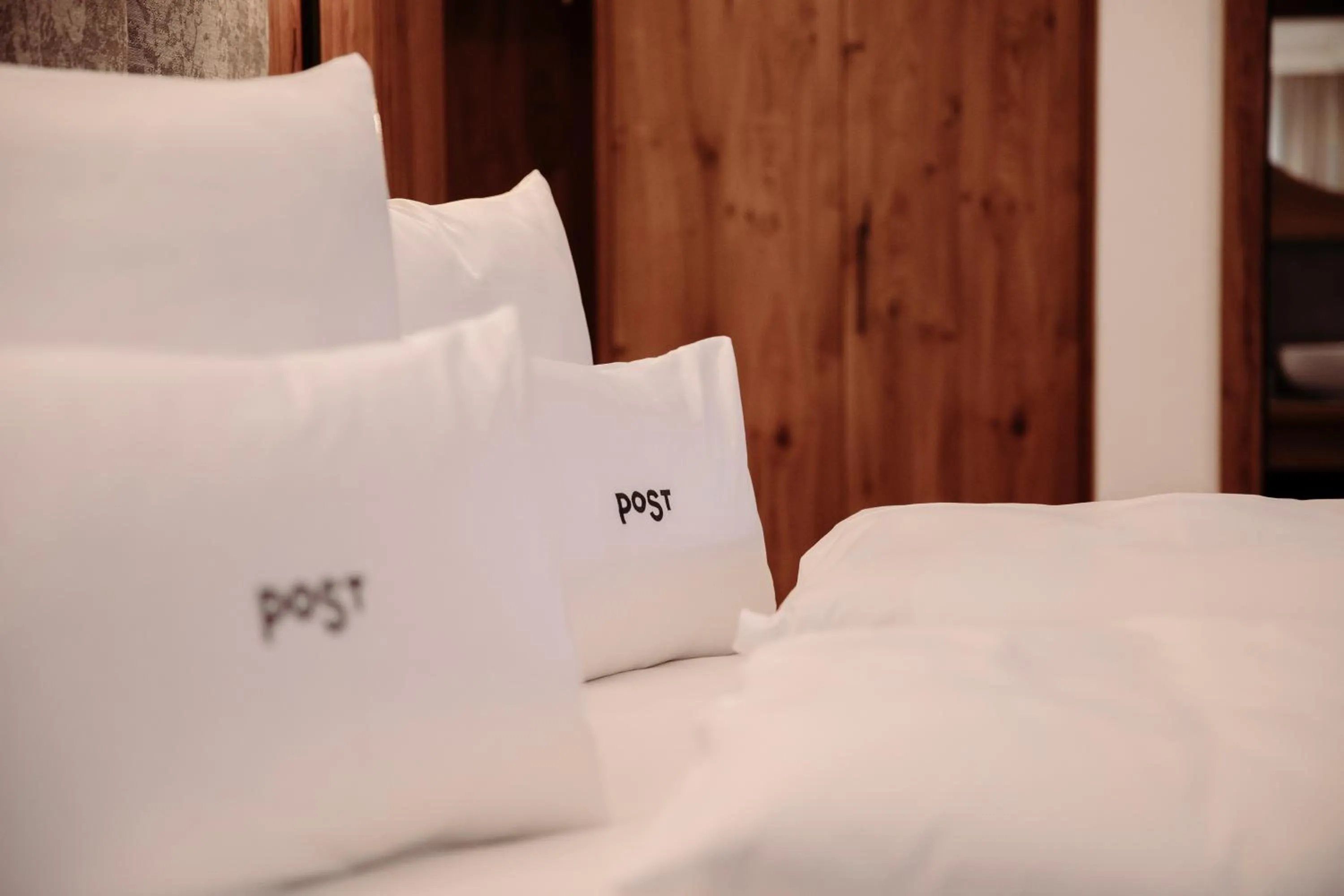 Bed in PoSt Boutique Apartments