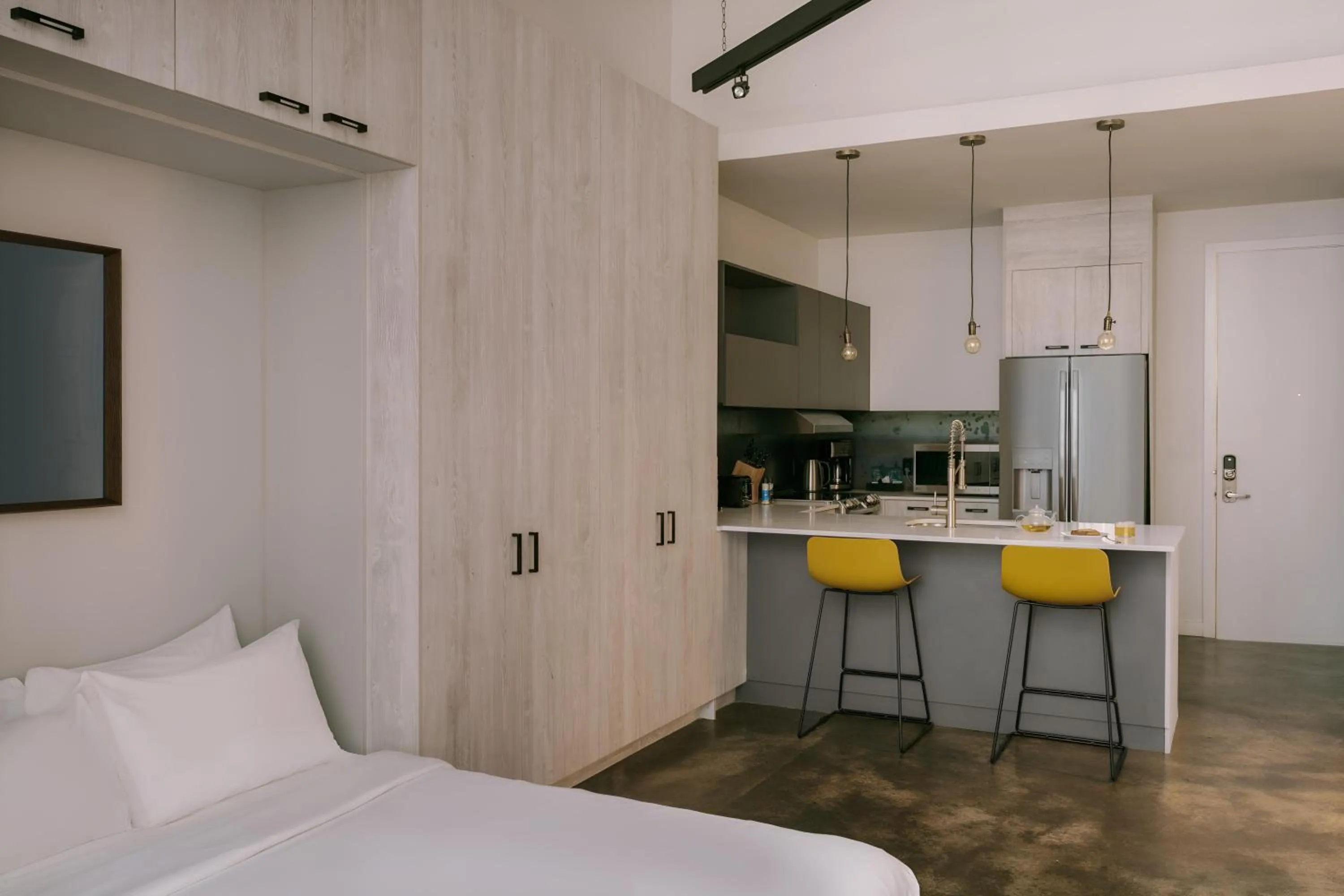 kitchen, Bed in The Heid Lofts by Reside, a Wyndham Residence
