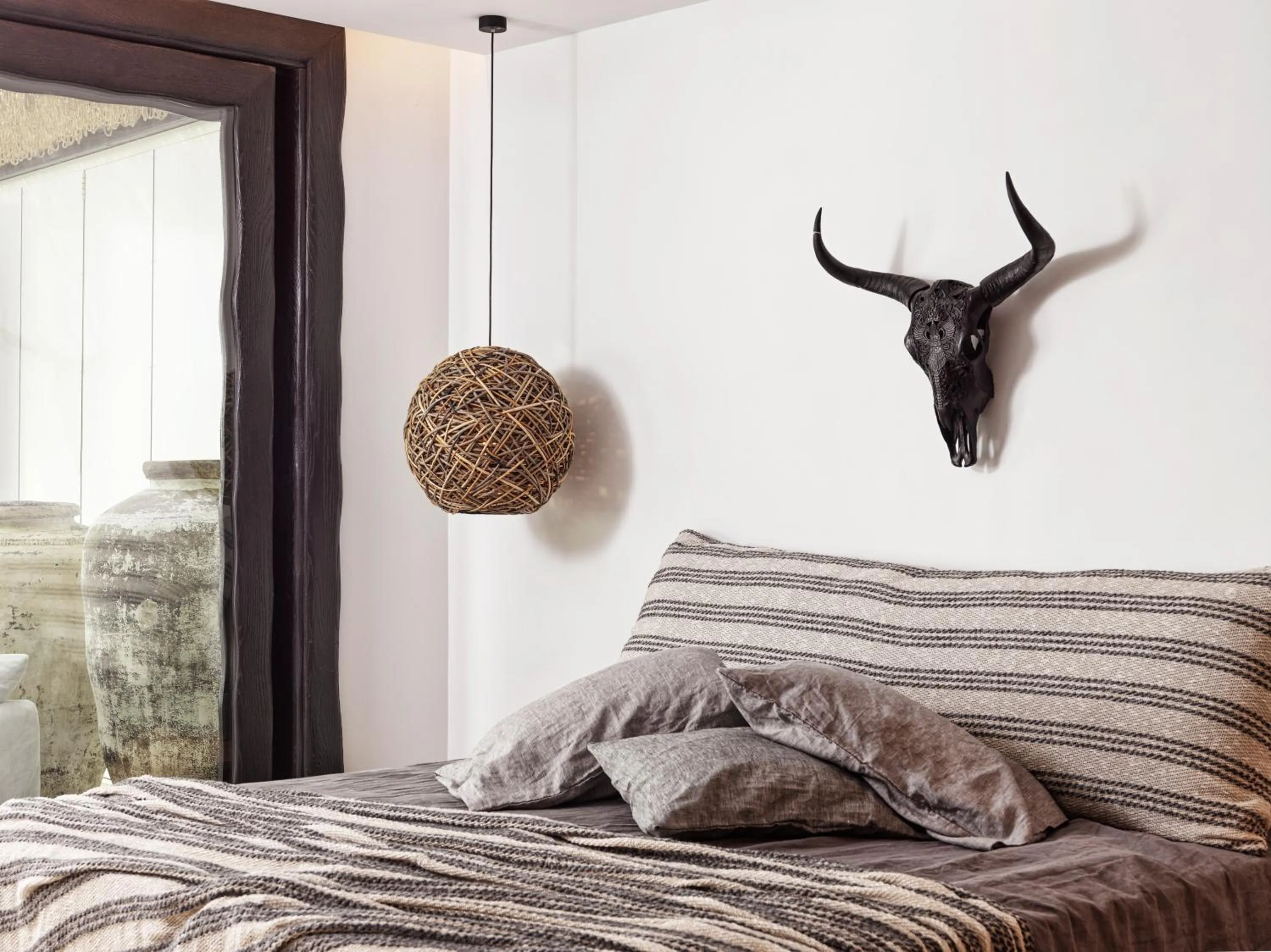 Bed in Myconian Panoptis Escape, a member of Small Luxury Hotels of the World