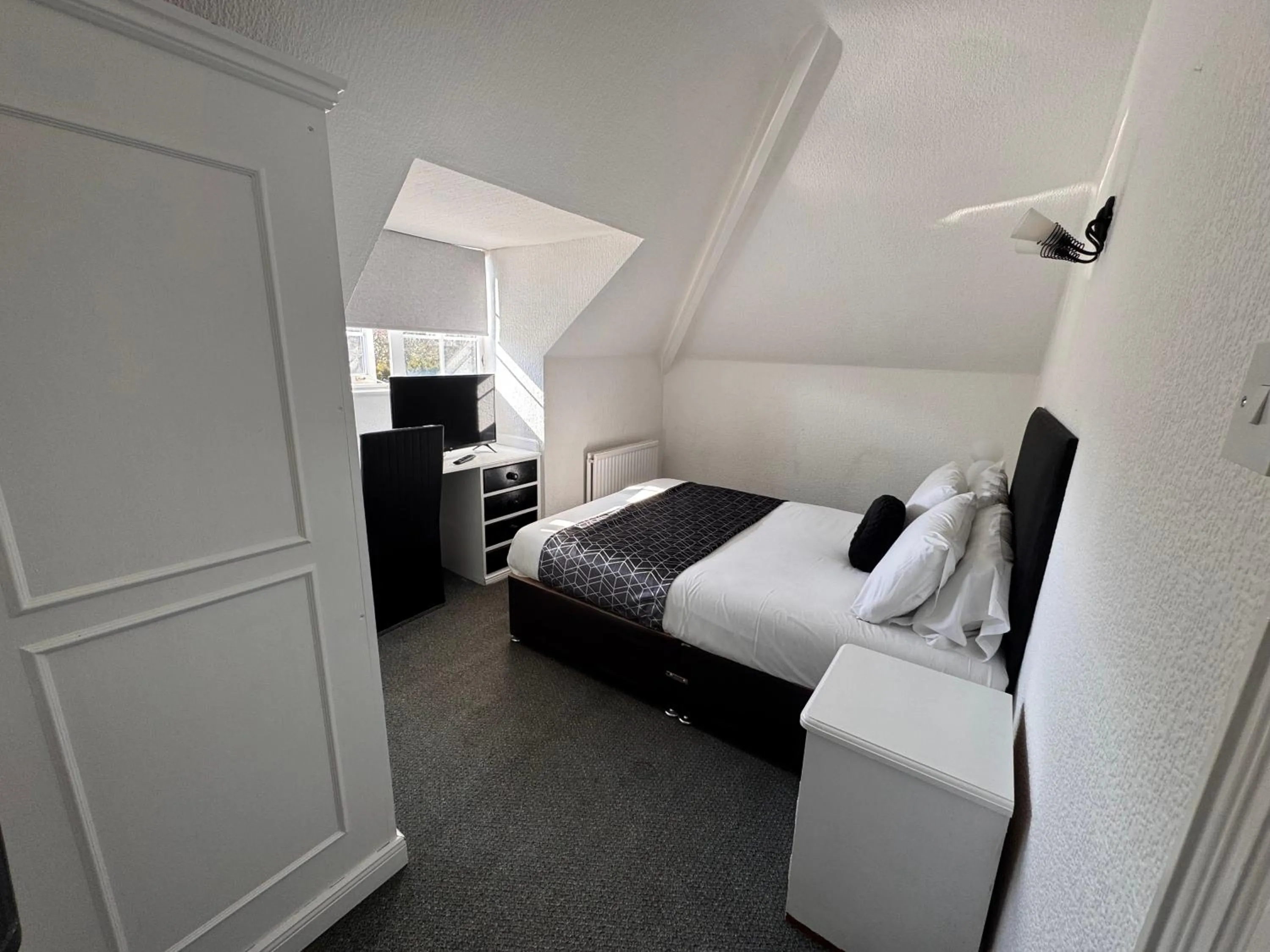 Bed in Charnwood Regency Guest House