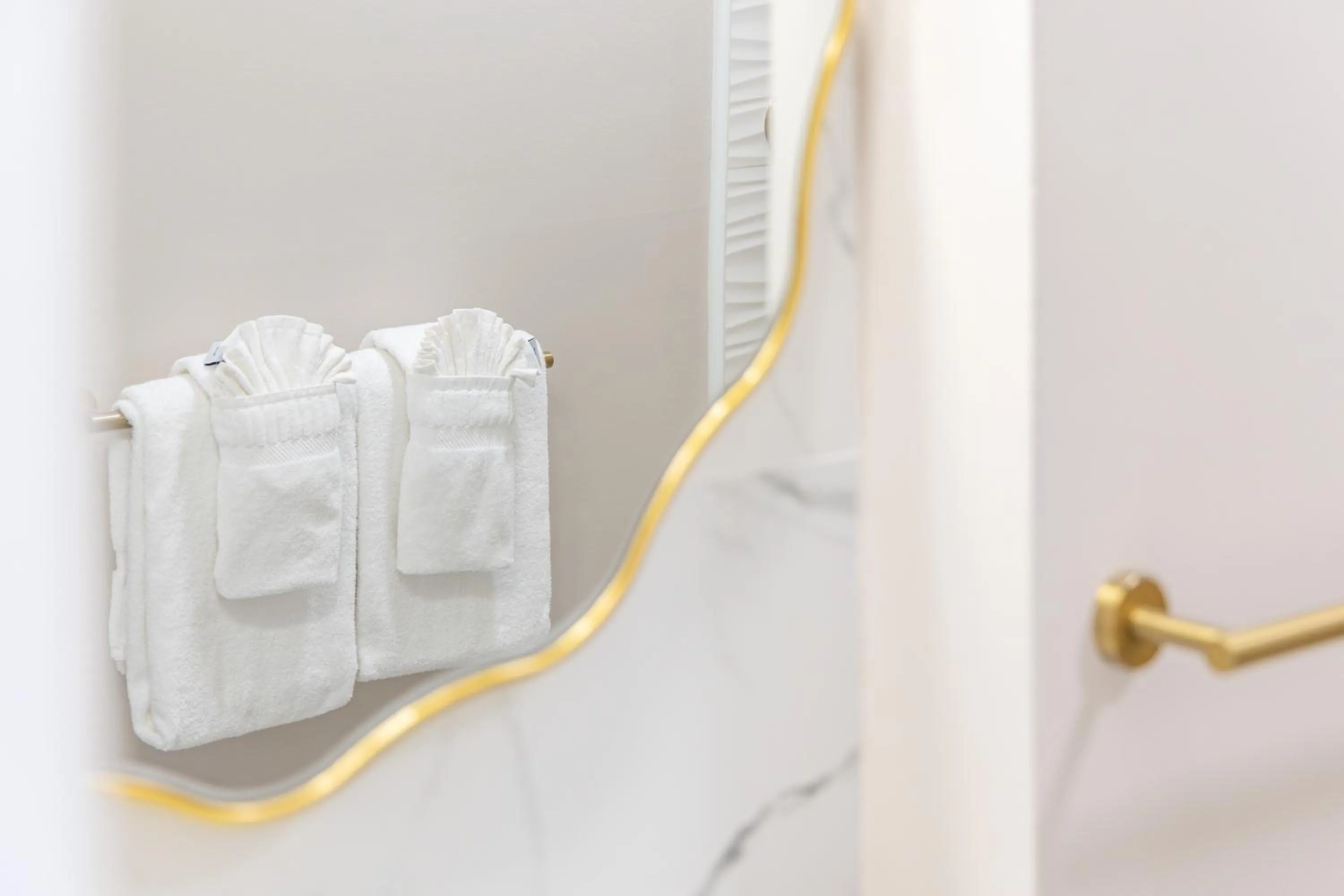 Bathroom in Steps to Waikiki Beach! Newly Renovated with 75" TV