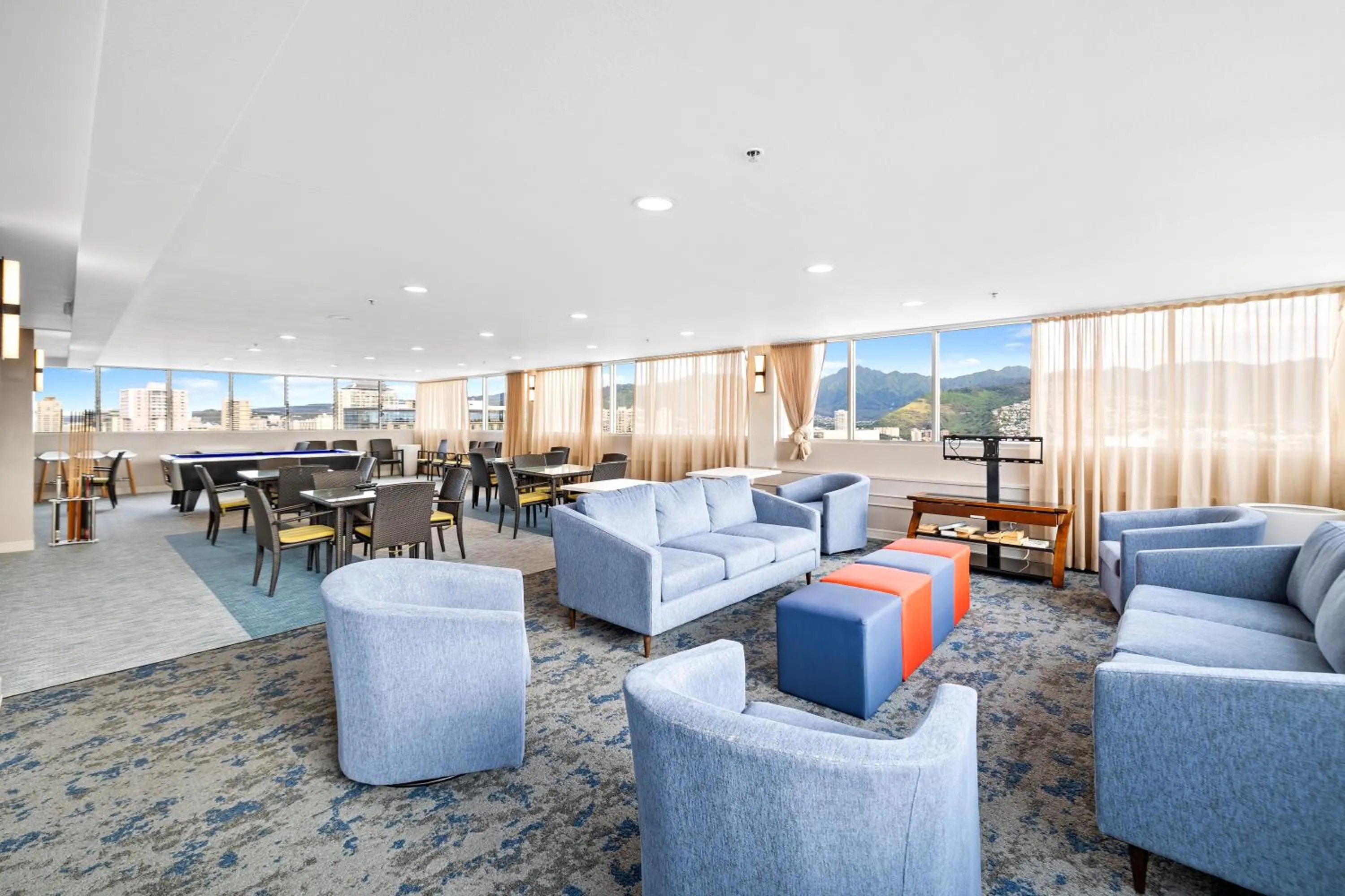 Seating area in Steps to Waikiki Beach! Newly Renovated with 75" TV