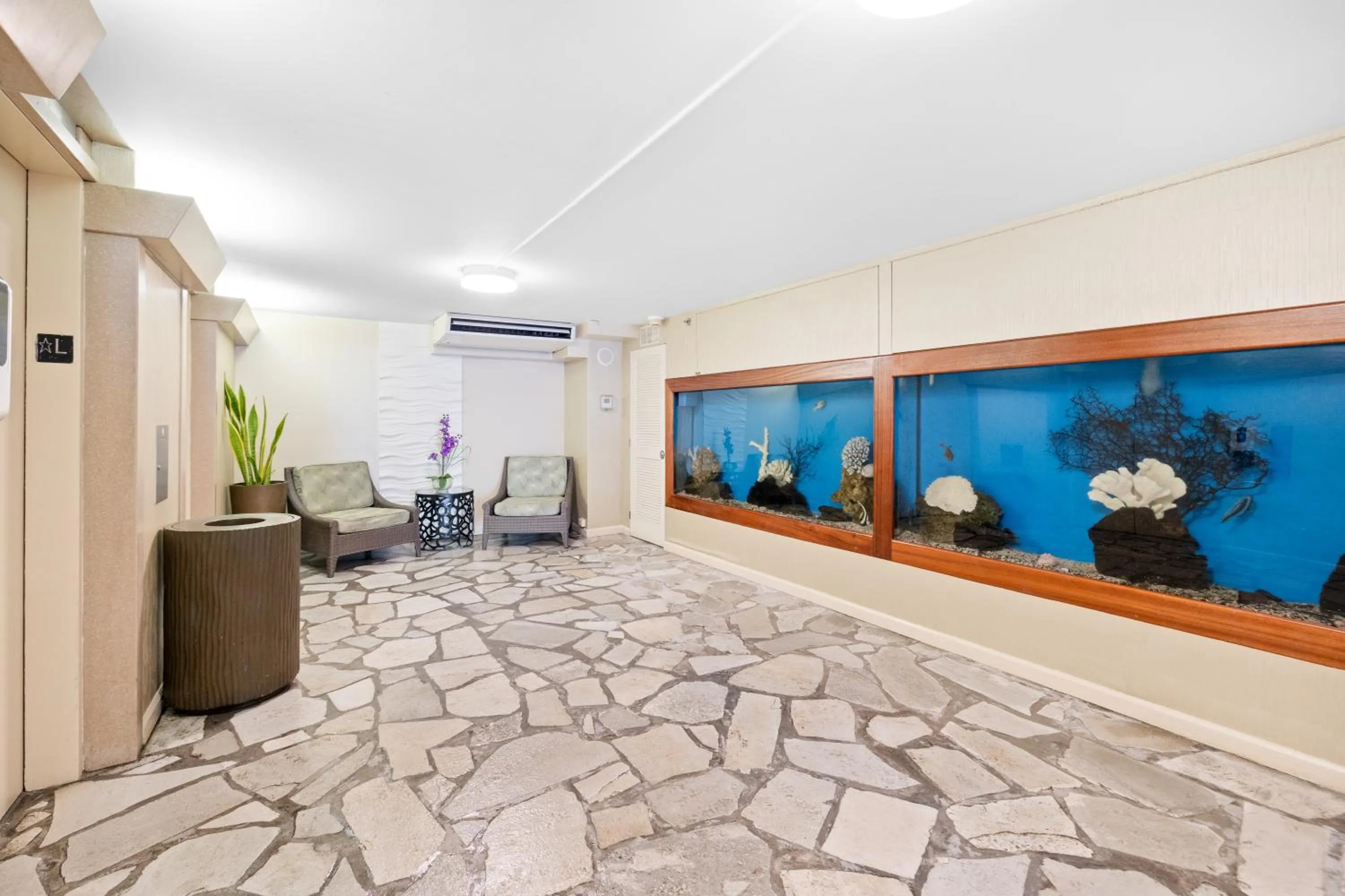elevator in Steps to Waikiki Beach! Newly Renovated with 75" TV