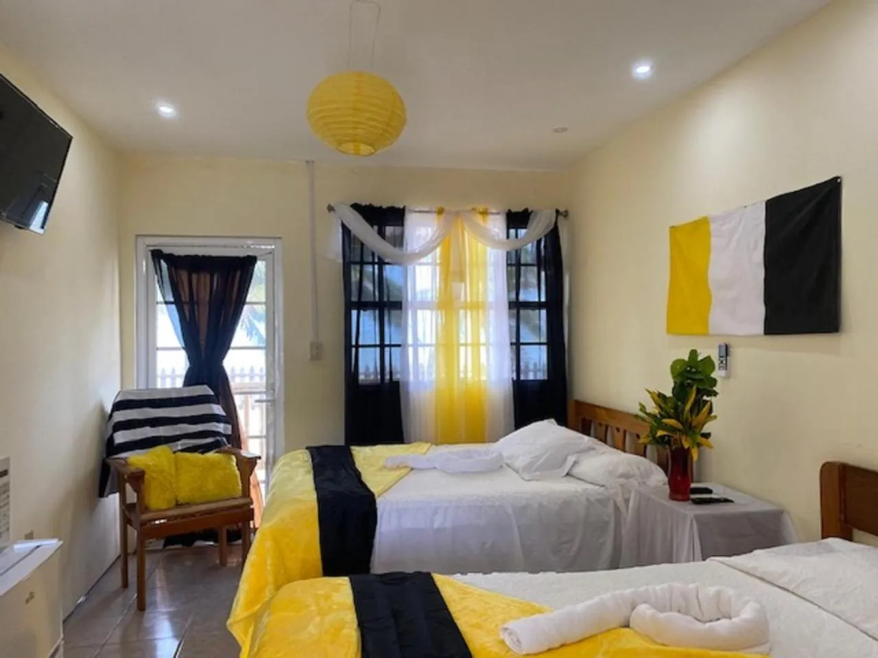 Photo of the whole room, Bed in Pal's on the beach - Dangriga, Belize