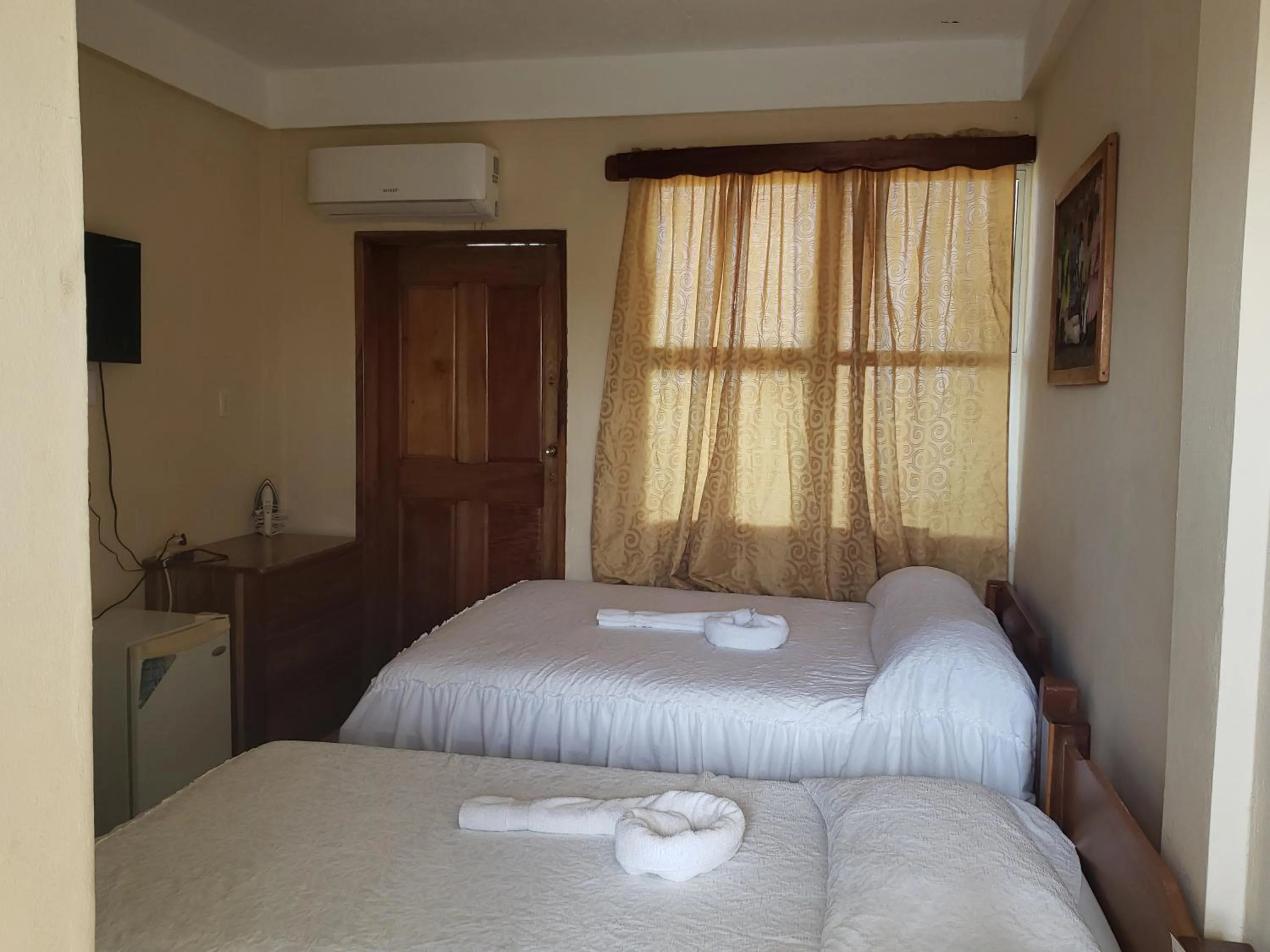 Photo of the whole room, Bed in Pal's on the beach - Dangriga, Belize