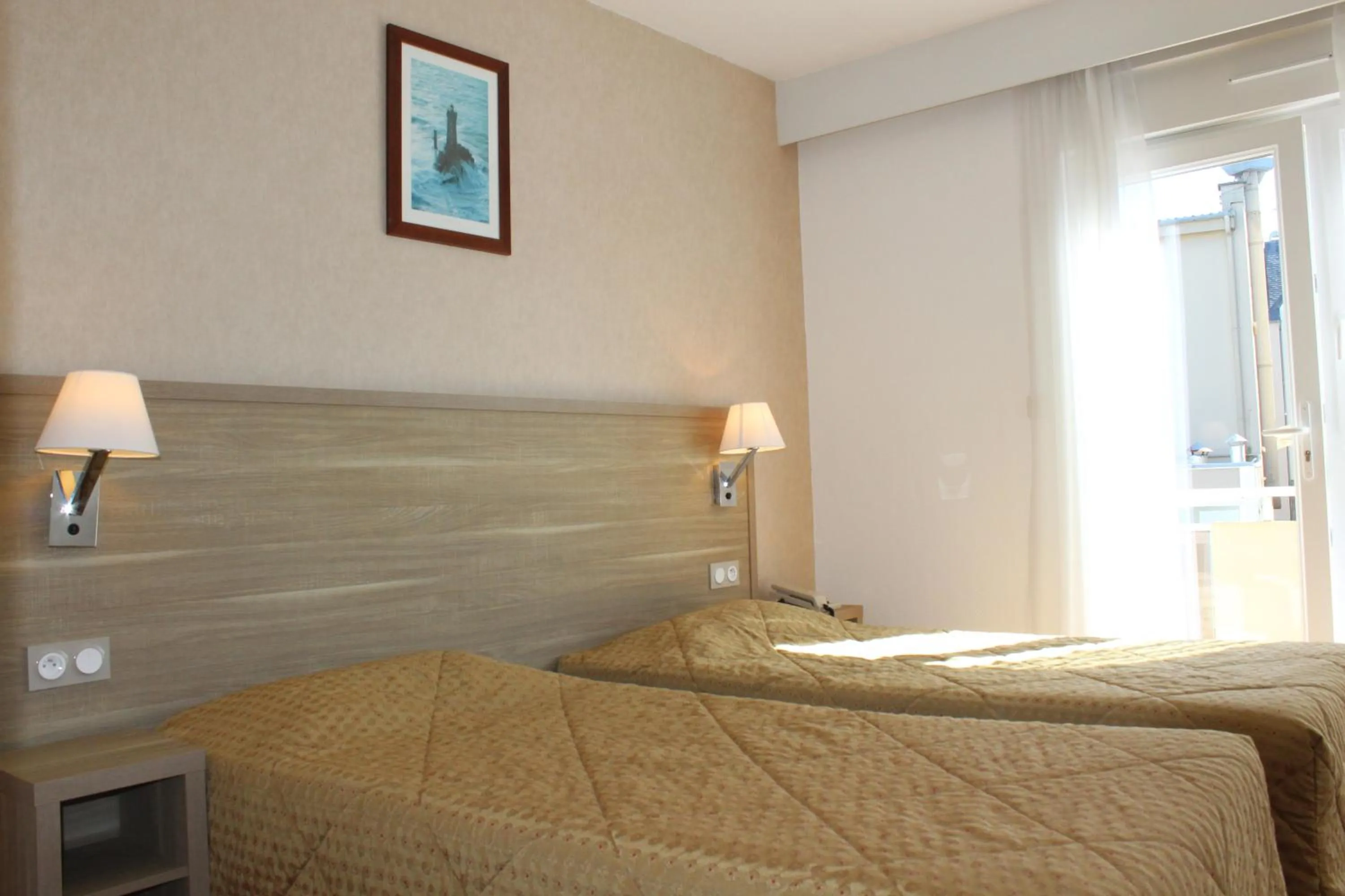 Bed in Hotel Des Tilleuls