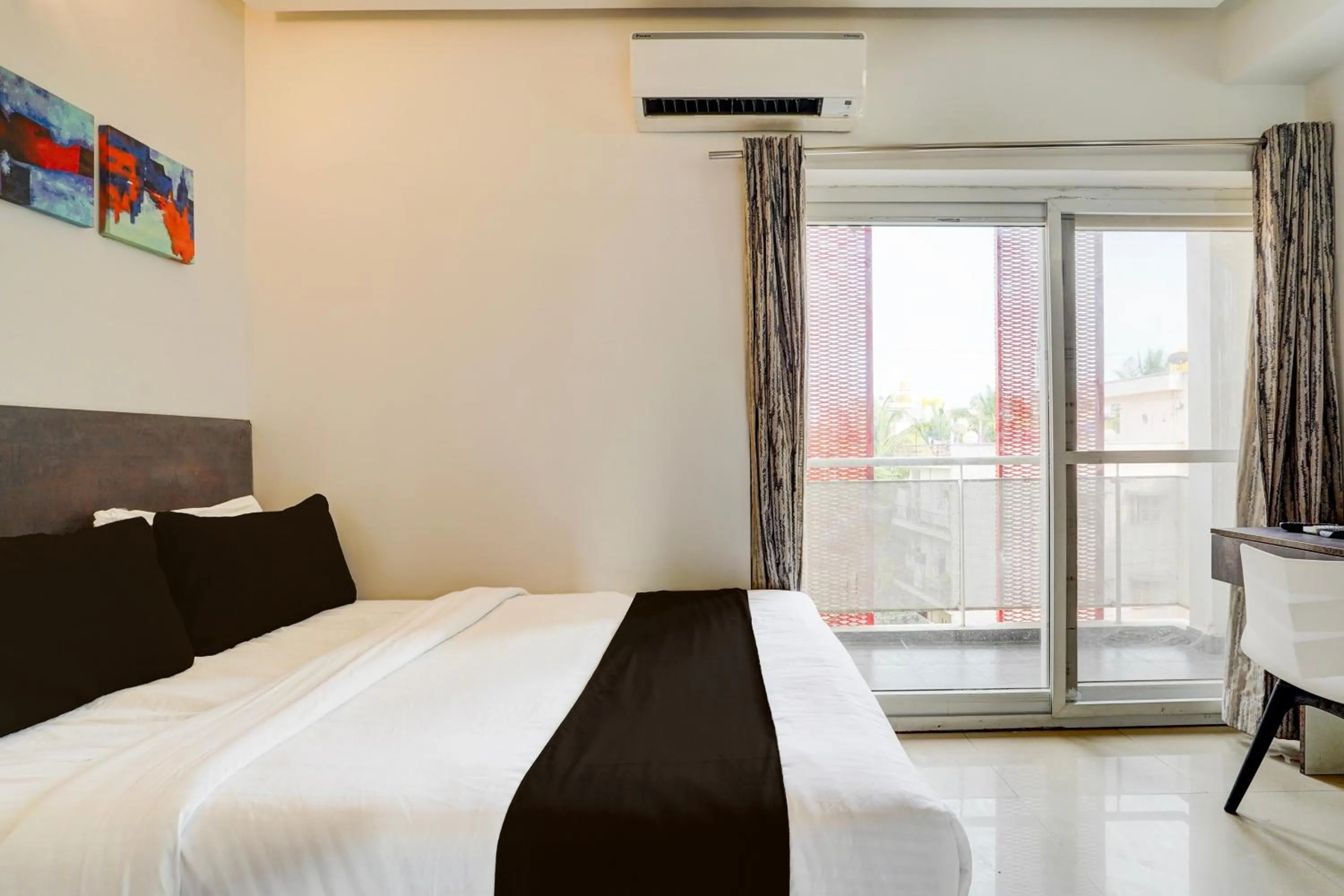 Bedroom, Bed in Super Townhouse Hebbal