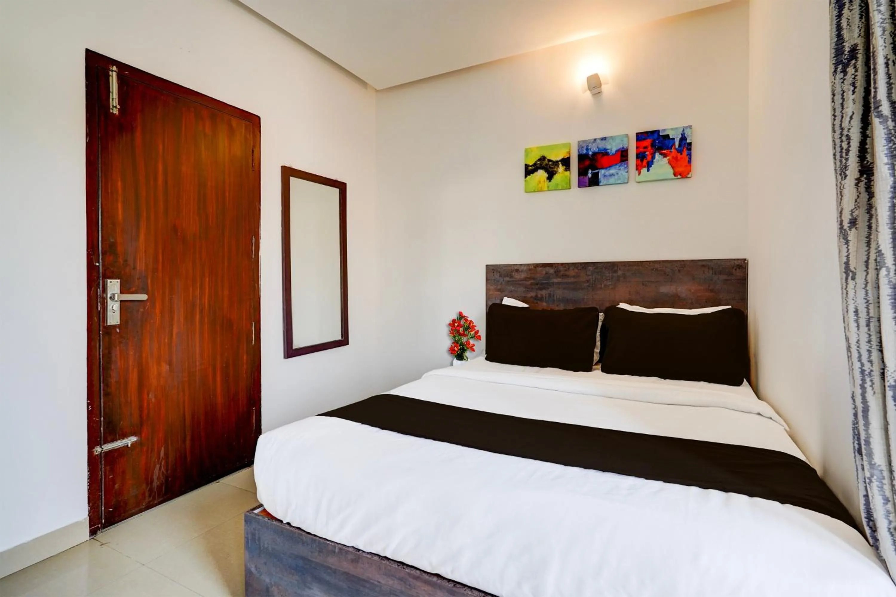 Bedroom, Bed in Super Townhouse Hebbal