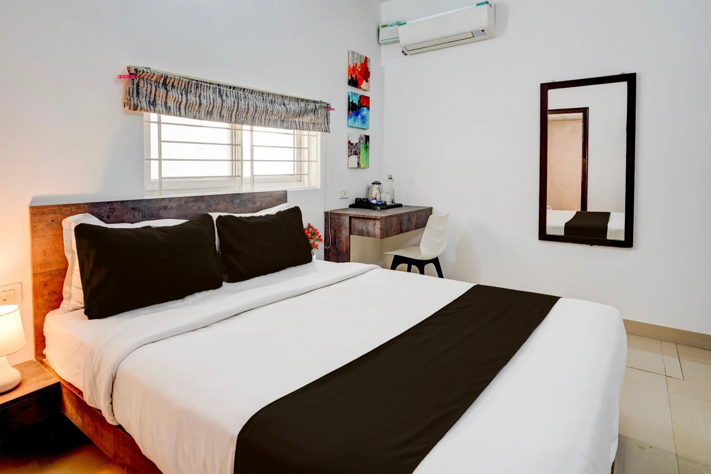 Bedroom, Bed in Super Townhouse Hebbal