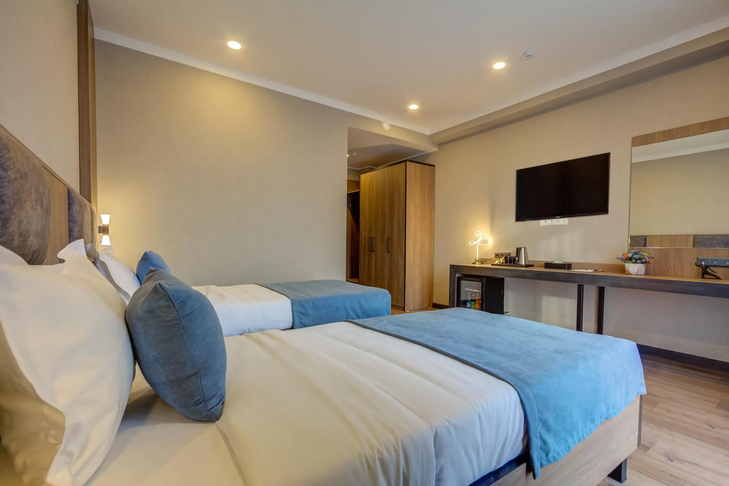 Bed in Sara Hotel Bishkek