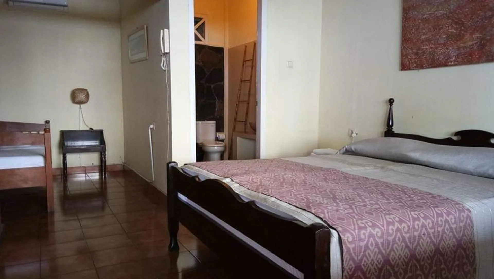 Bed in Bunga Ayu Seaside Resort