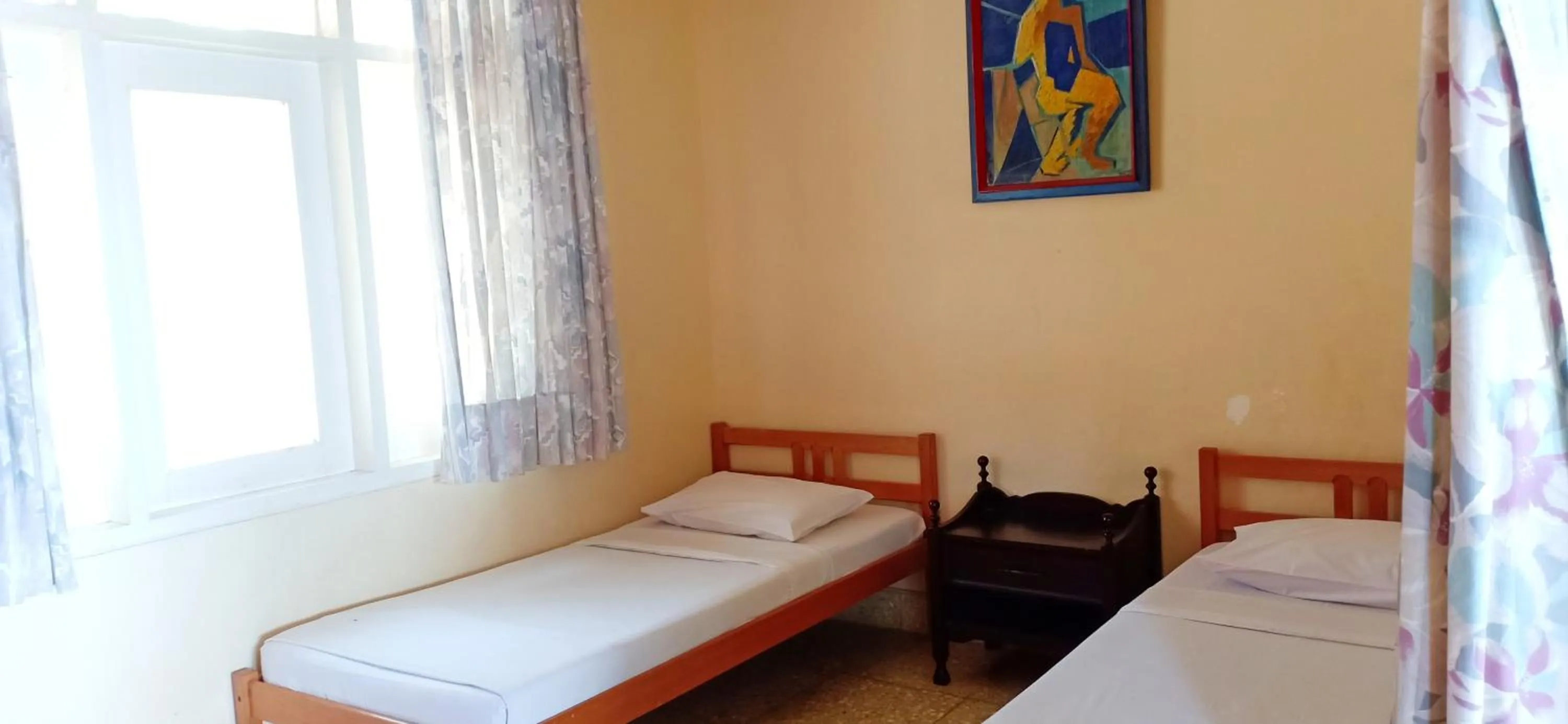 Bed in Bunga Ayu Seaside Resort