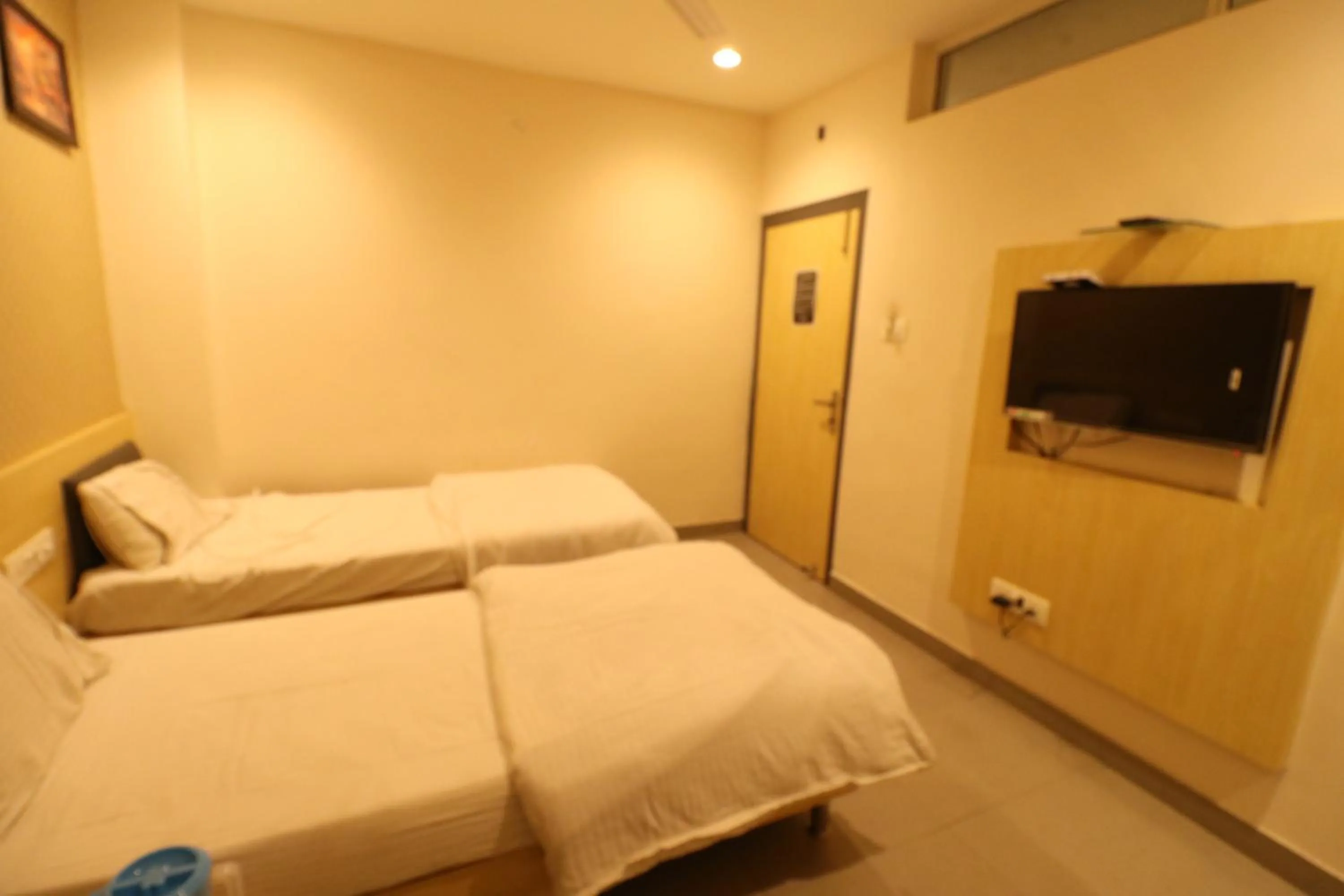 Photo of the whole room, Bed in HOTEL PRATAP GRAND