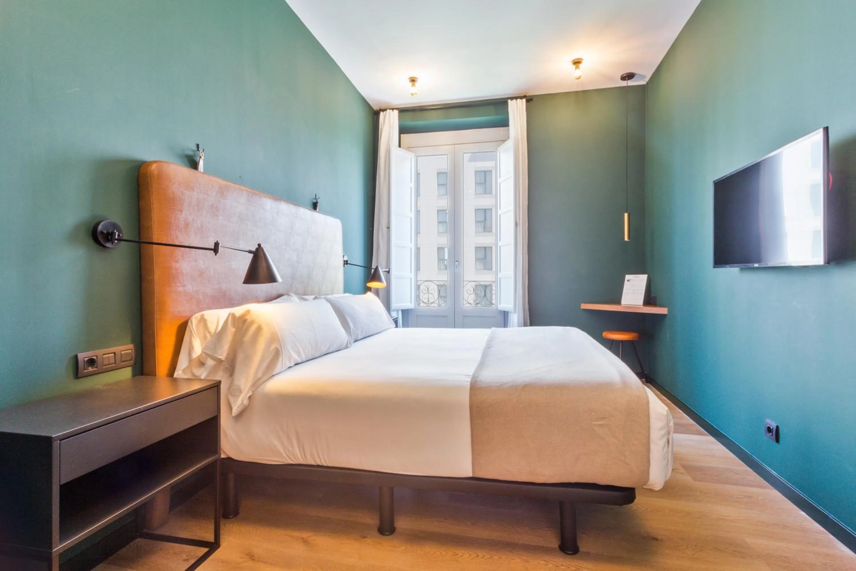 Bedroom, Bed in Uma Suites Atocha