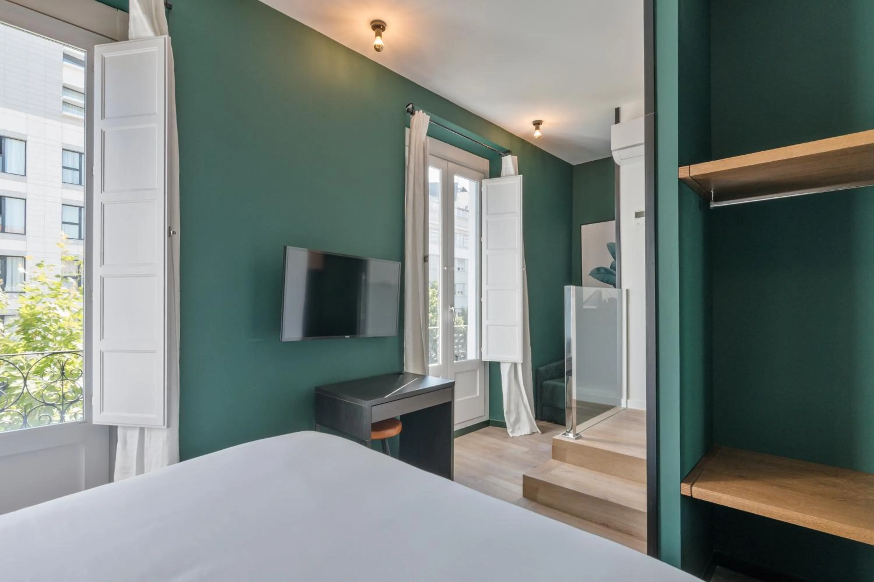 Bedroom, Bed in Uma Suites Atocha