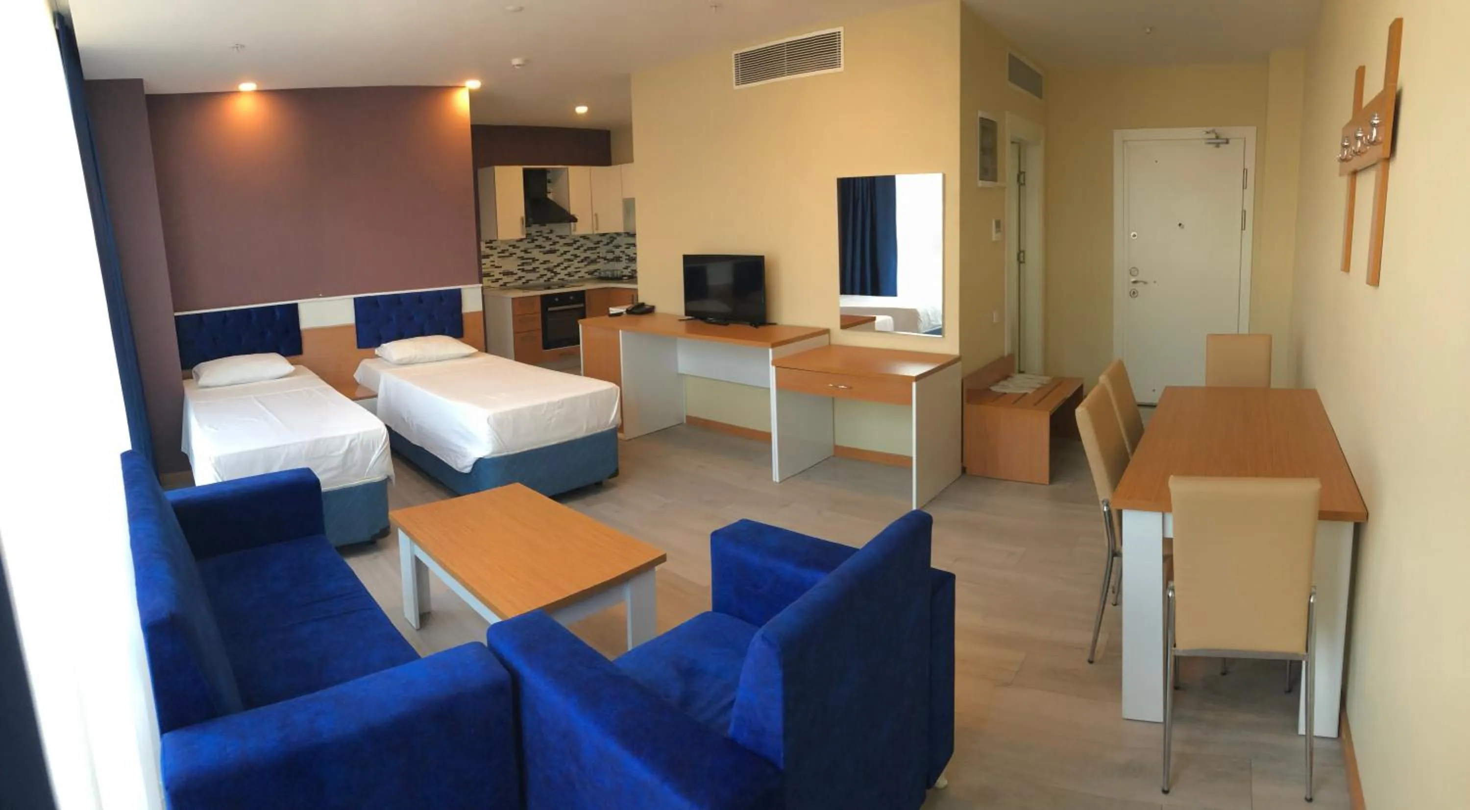 Living room, Bed in SKYBLUE İSTANBUL HOTEL