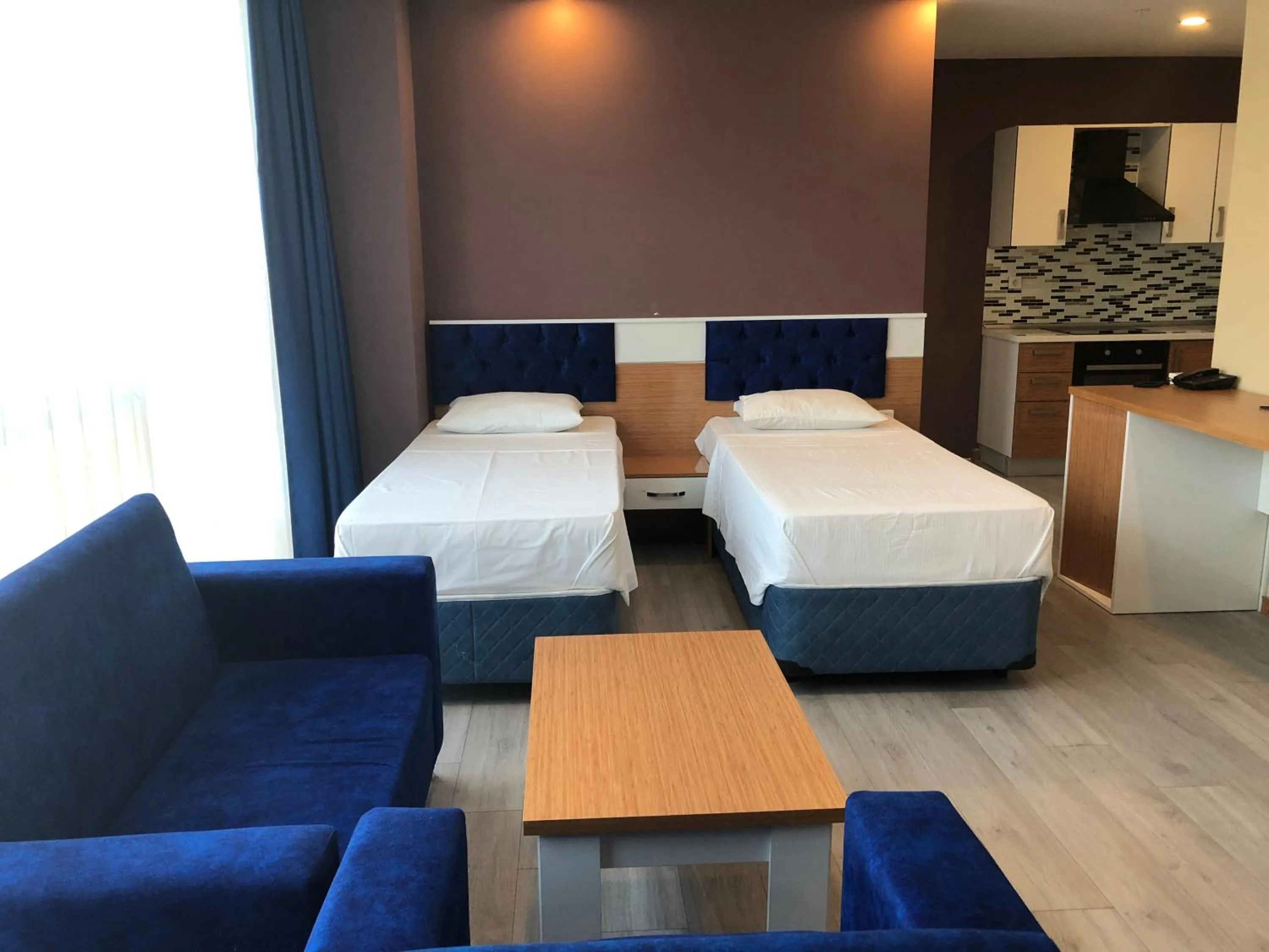 Living room, Bed in SKYBLUE İSTANBUL HOTEL