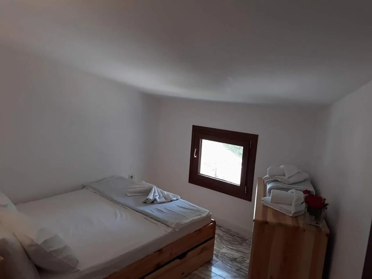 Bed in Kinira Beach Hotel