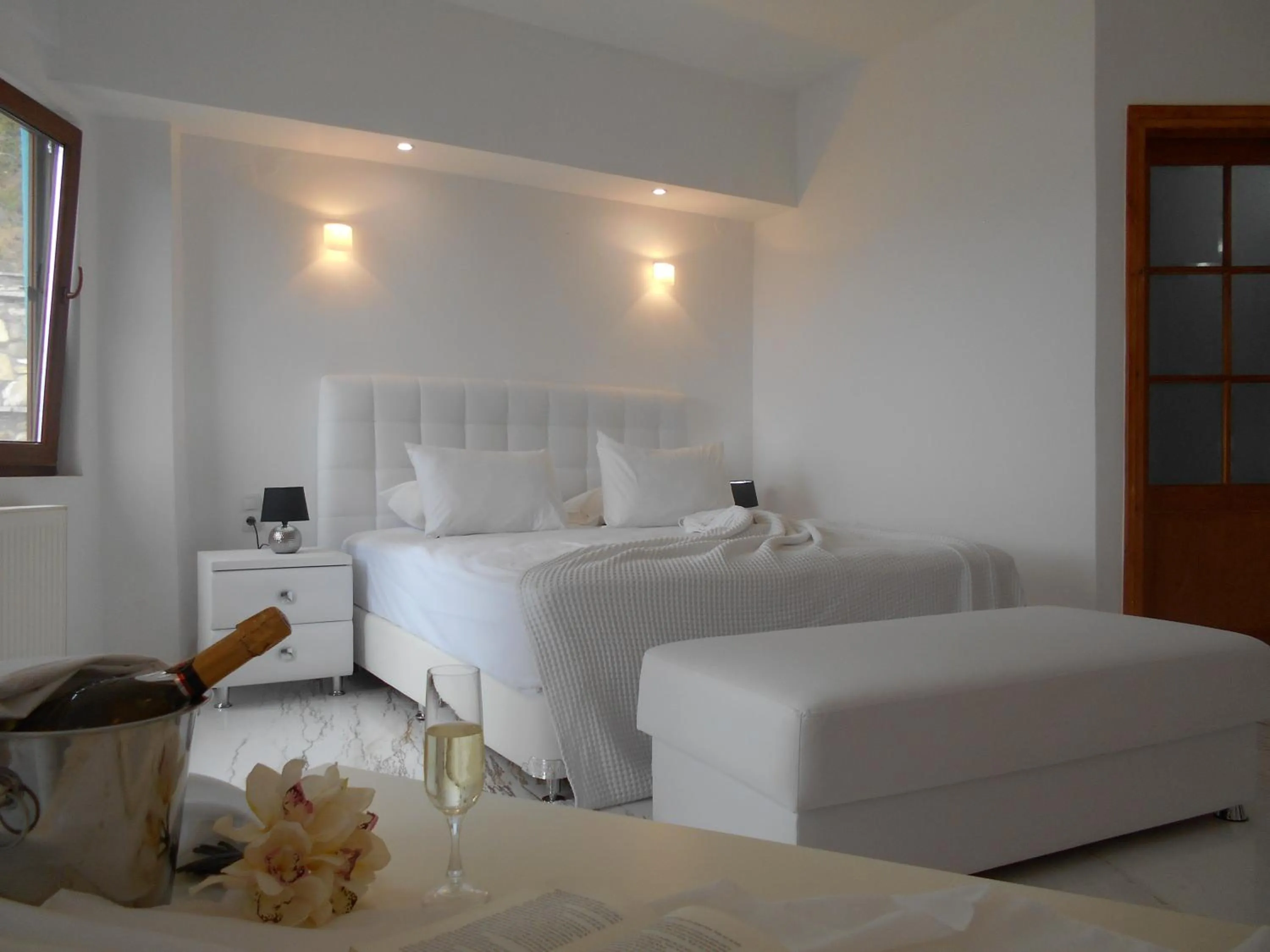 Bed in Kinira Beach Hotel