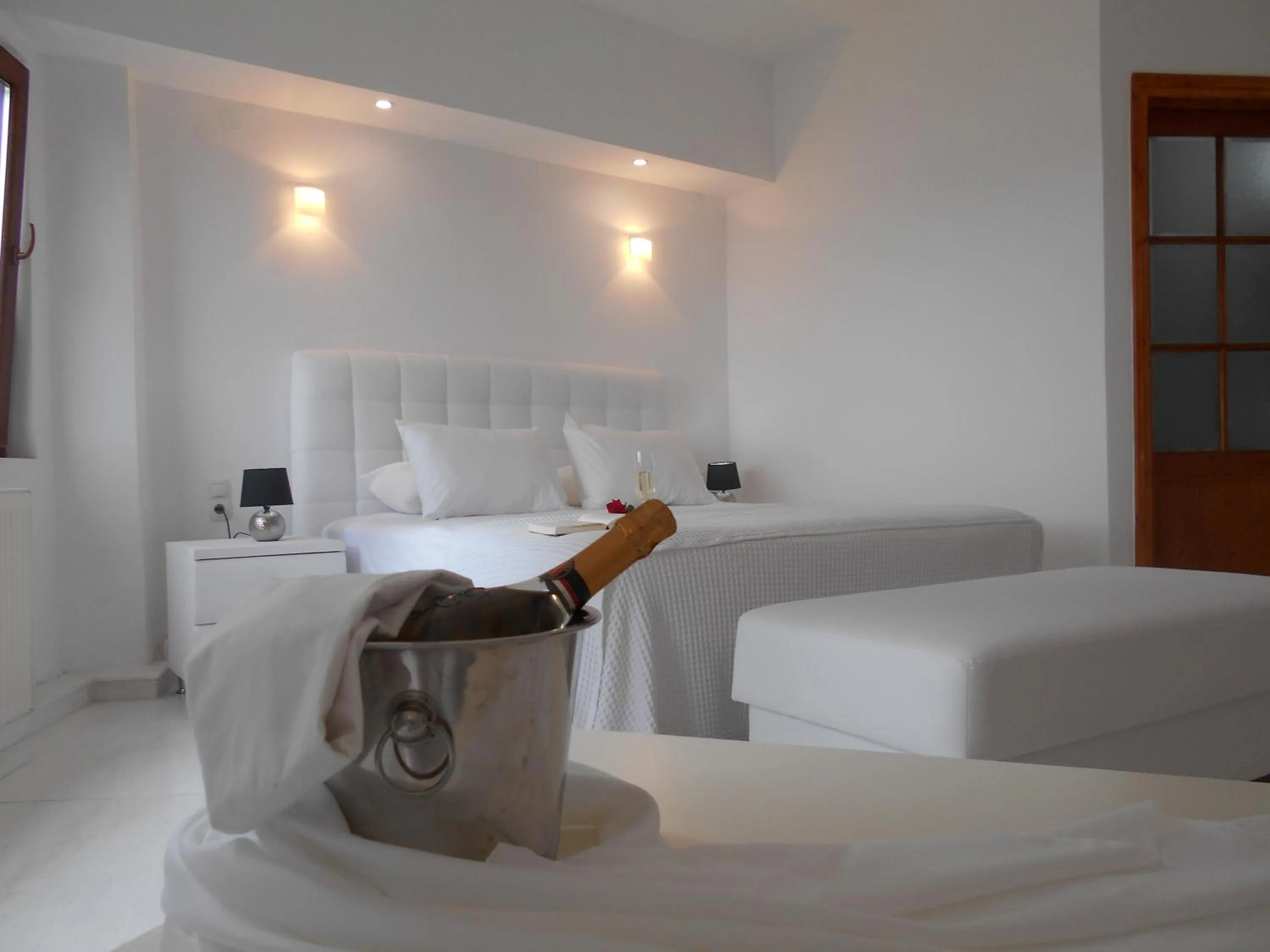 Bed in Kinira Beach Hotel