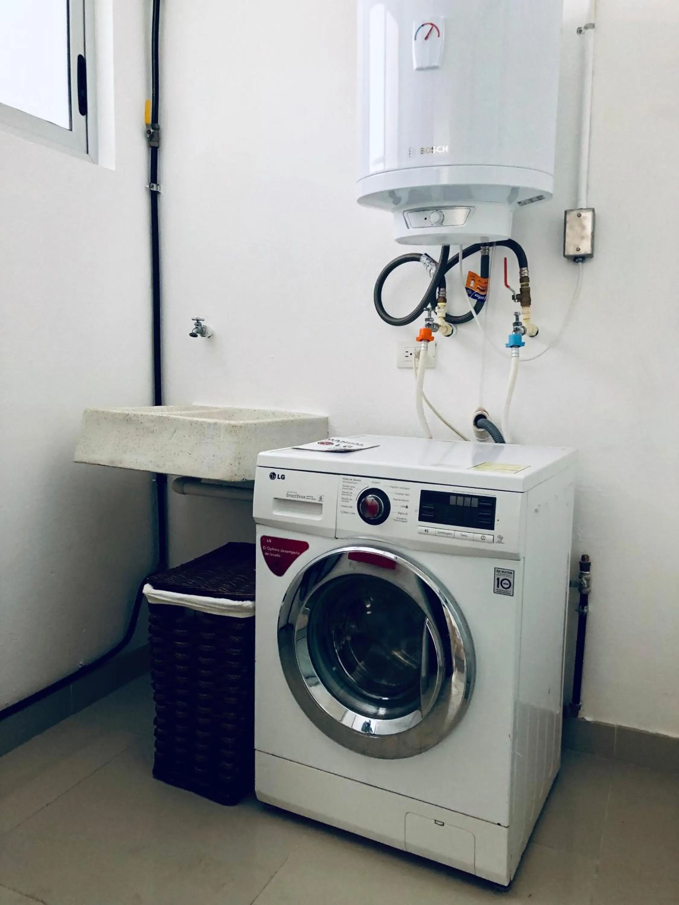 washing machine in Suites Malecon Cancun