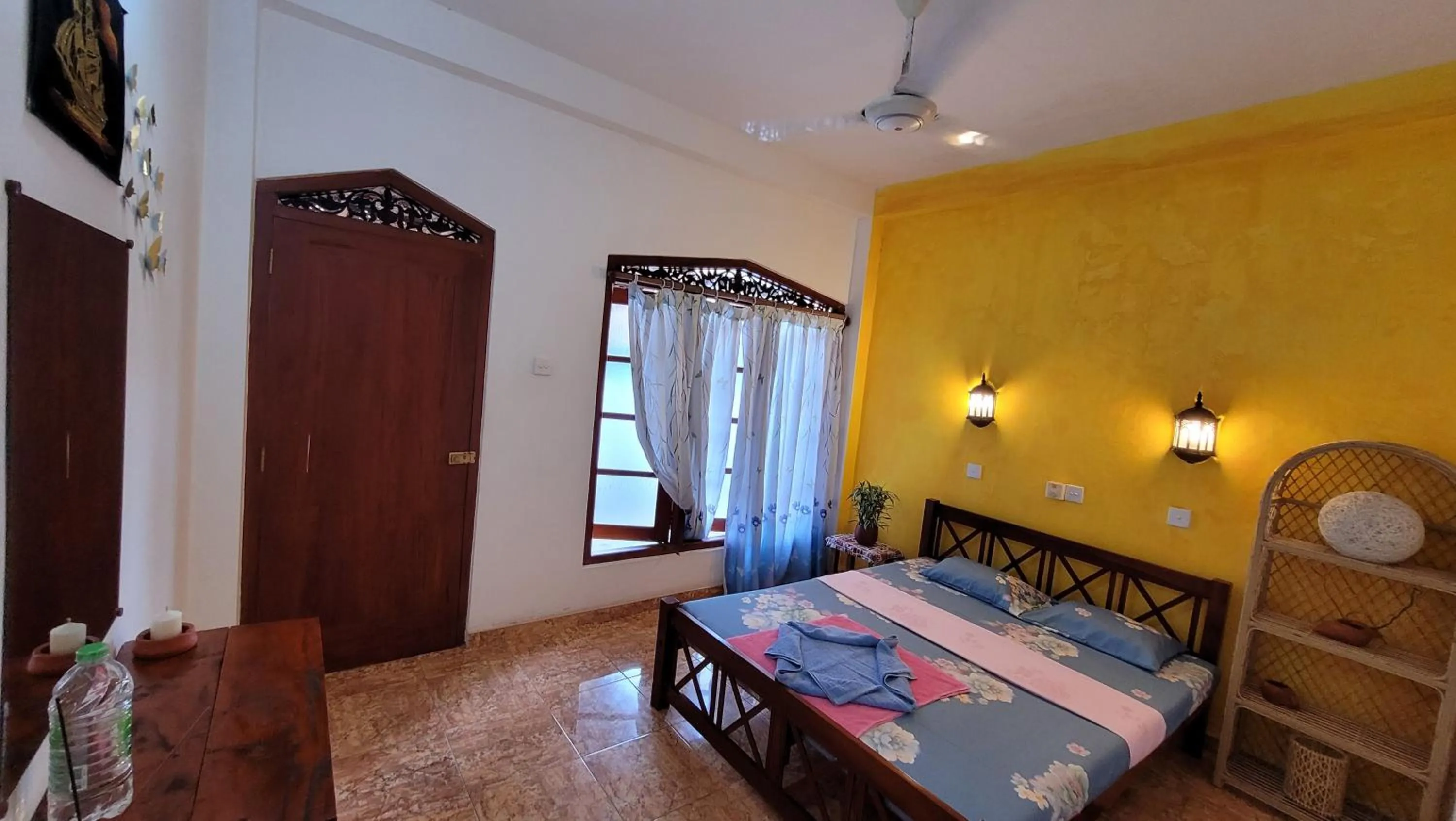 Bed in Malika's Yellow House