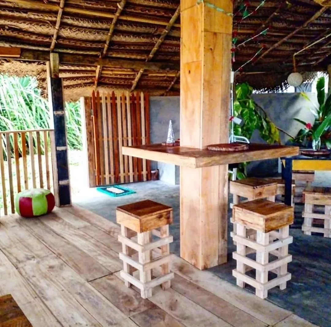 Malika's Yellow House