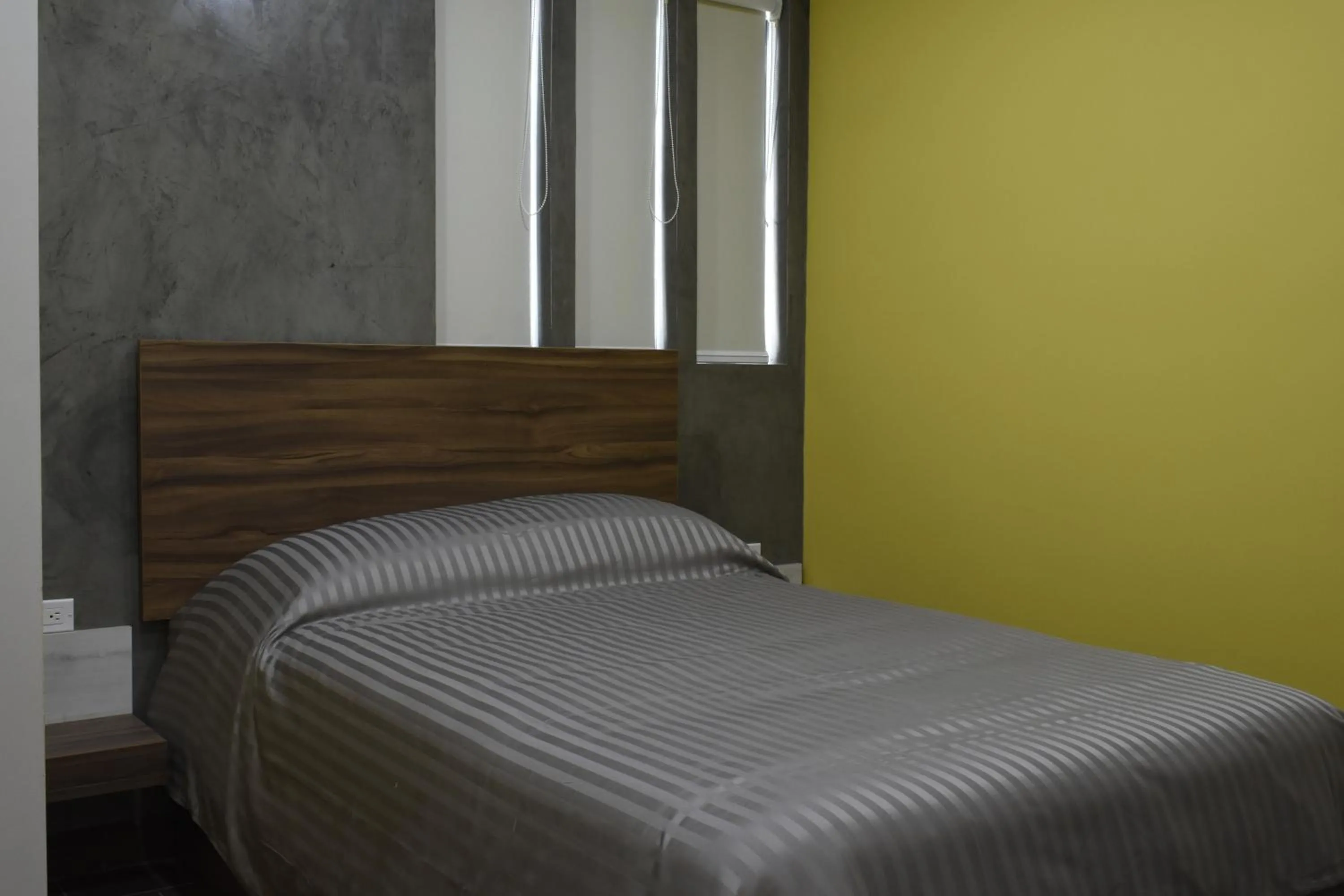 Bed in TJ Border Suites by Hosted by Me