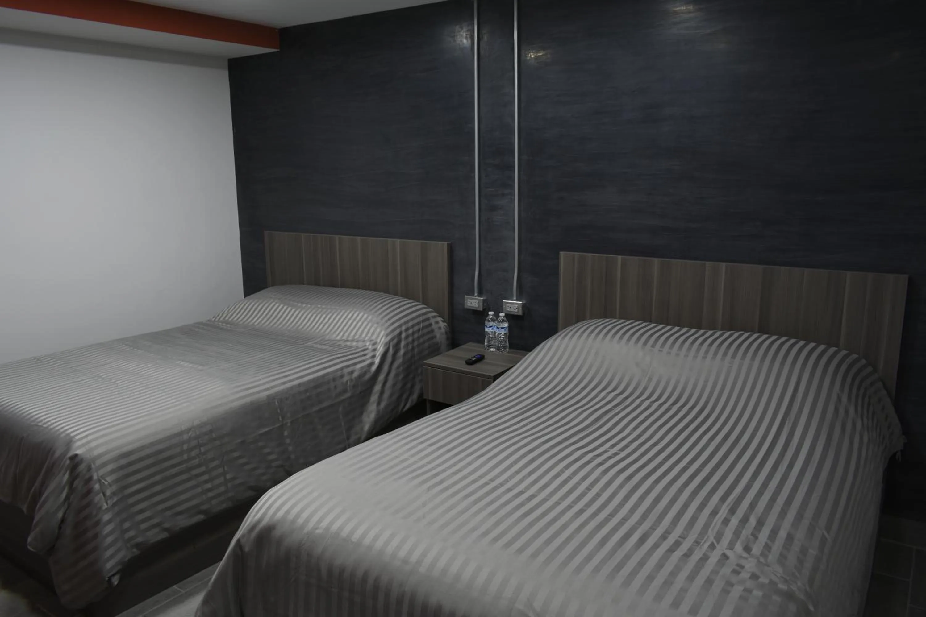 Bed in TJ Border Suites by Hosted by Me