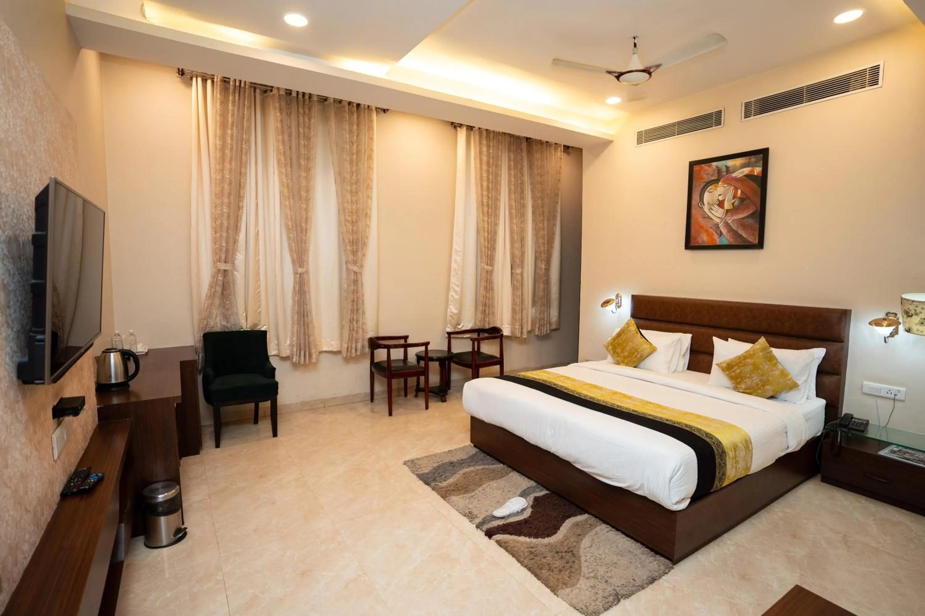 Bed in Hotel Radiance Courtyard