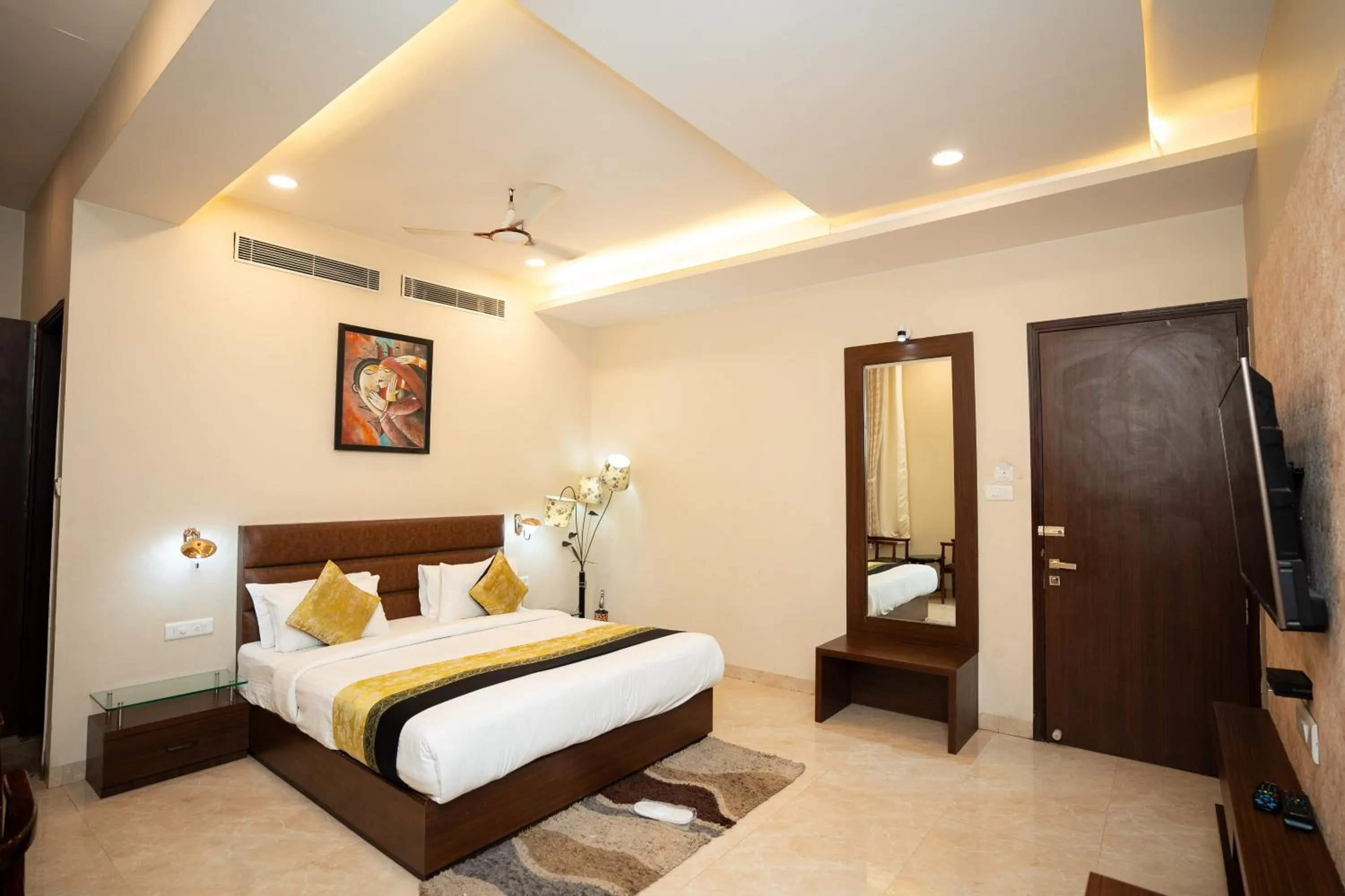 Bed in Hotel Radiance Courtyard