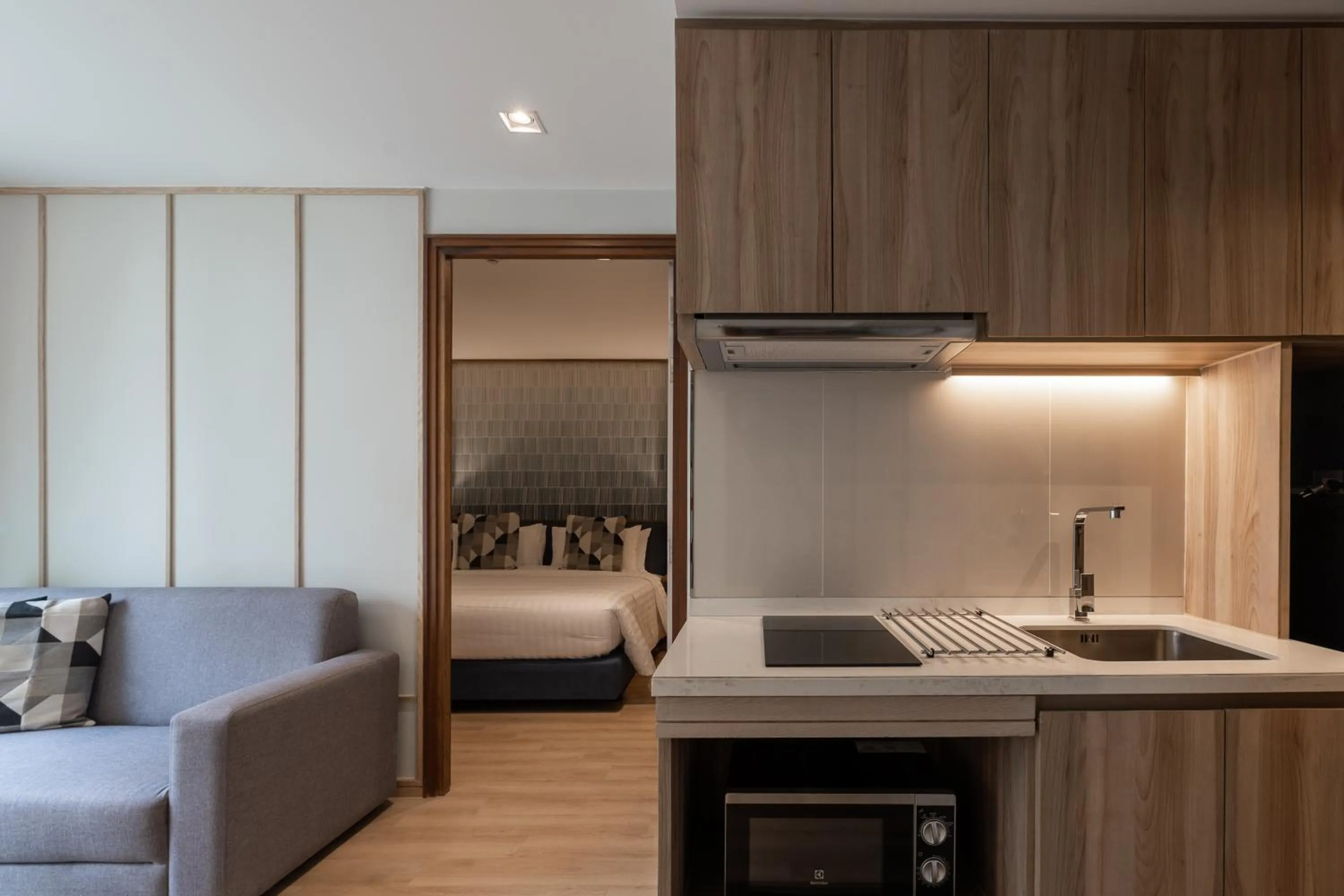 Kitchen or kitchenette in The Quarter Phromphong by UHG