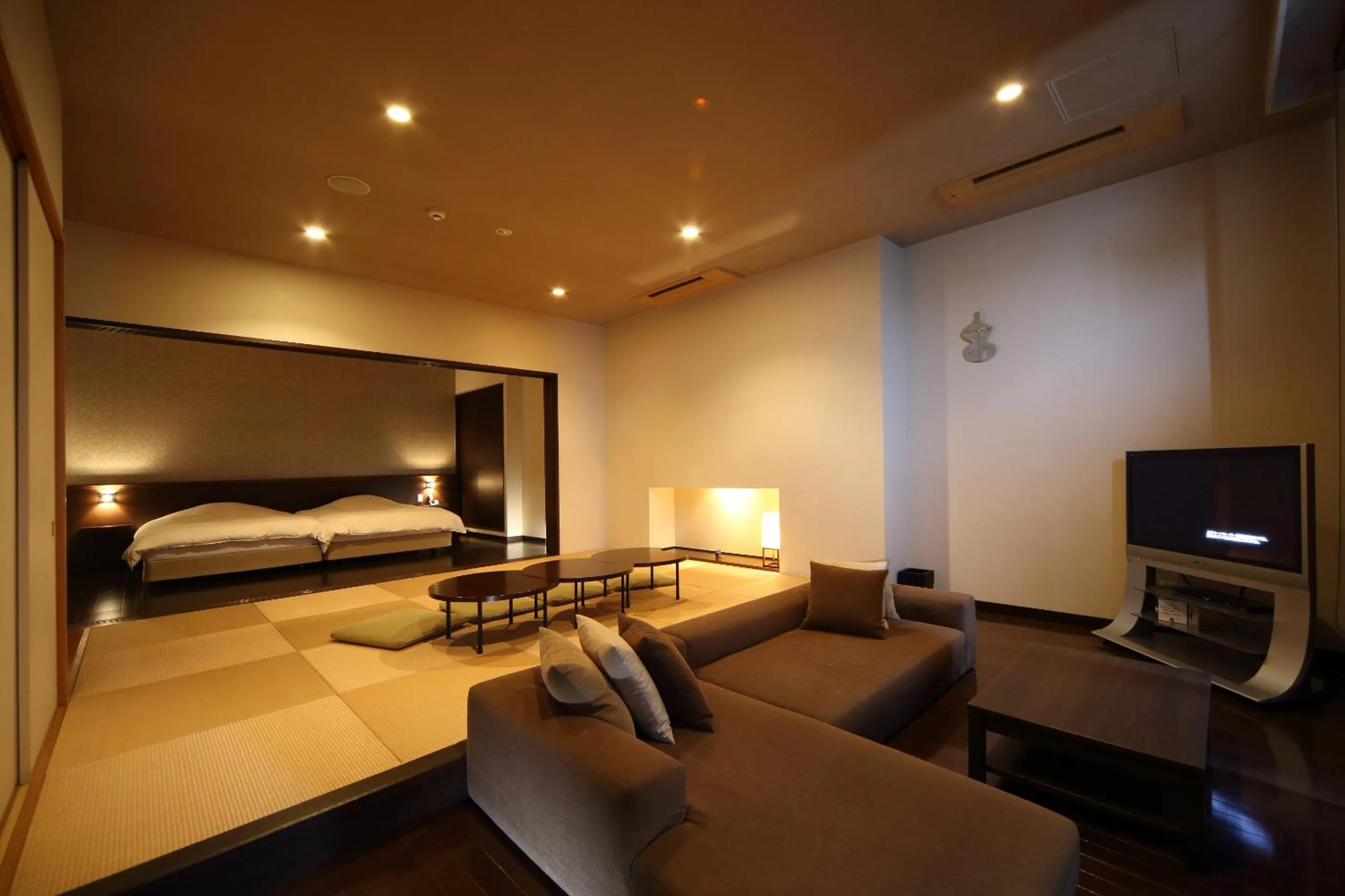 Living room, Bed in AMANE resort SEIKAI